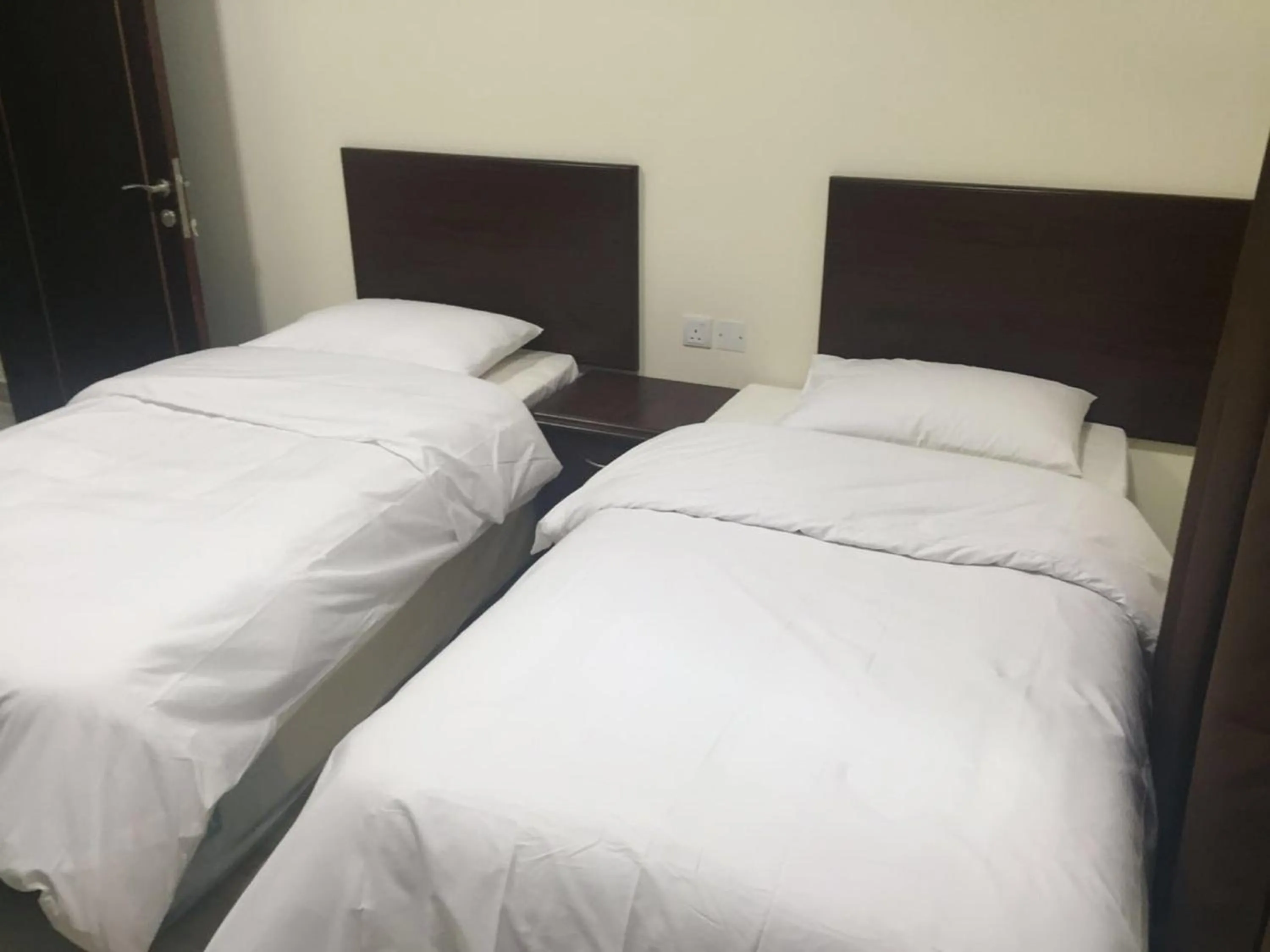 Bed in Al Noor Saadah Furnished Apartments
