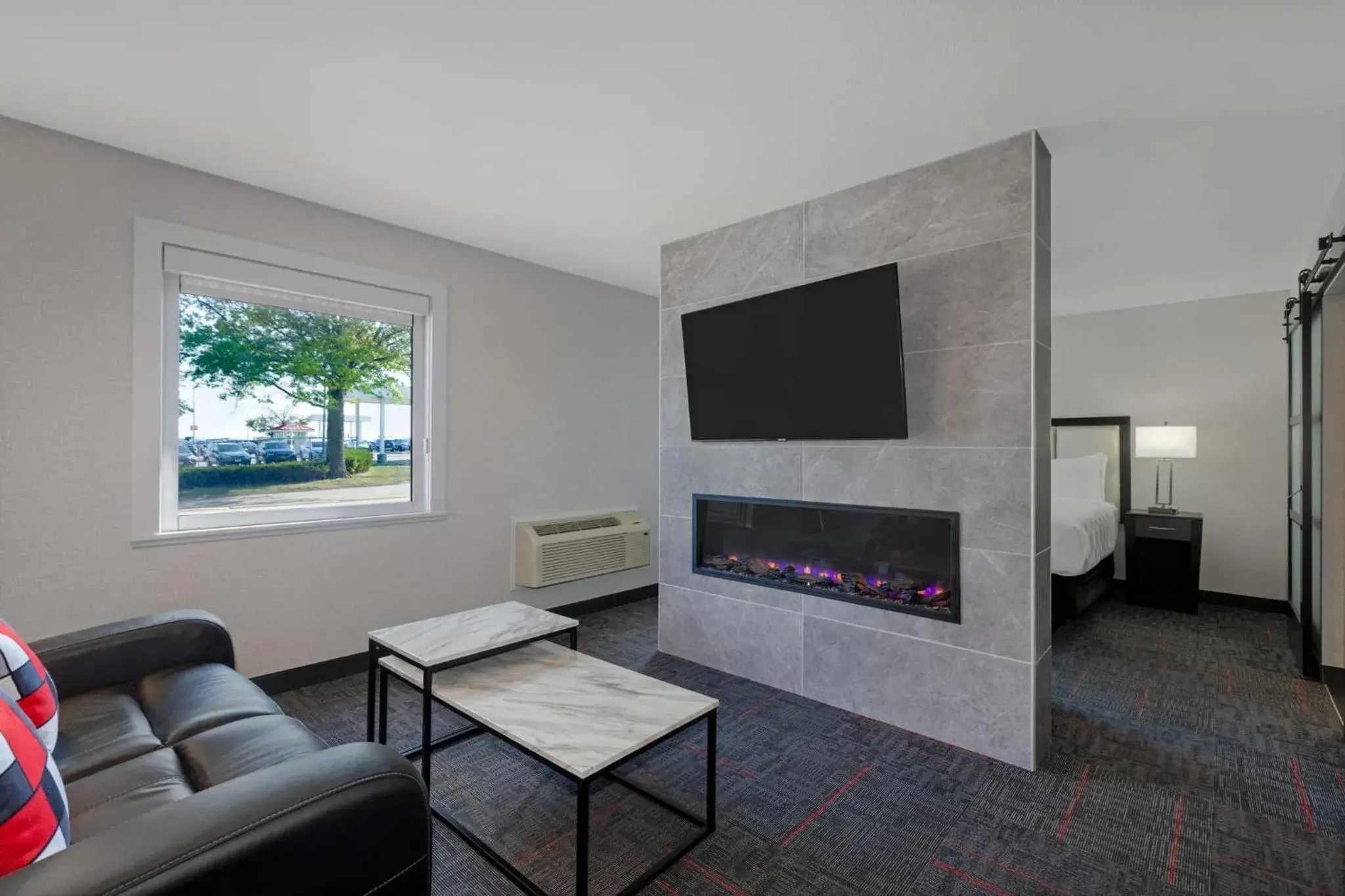 King Suite with Fireplace in Holiday Inn Des Moines-Airport Conf Center by IHG King Suite with Fireplace in Holiday Inn Des Moines-Airport Conf Center by IHG