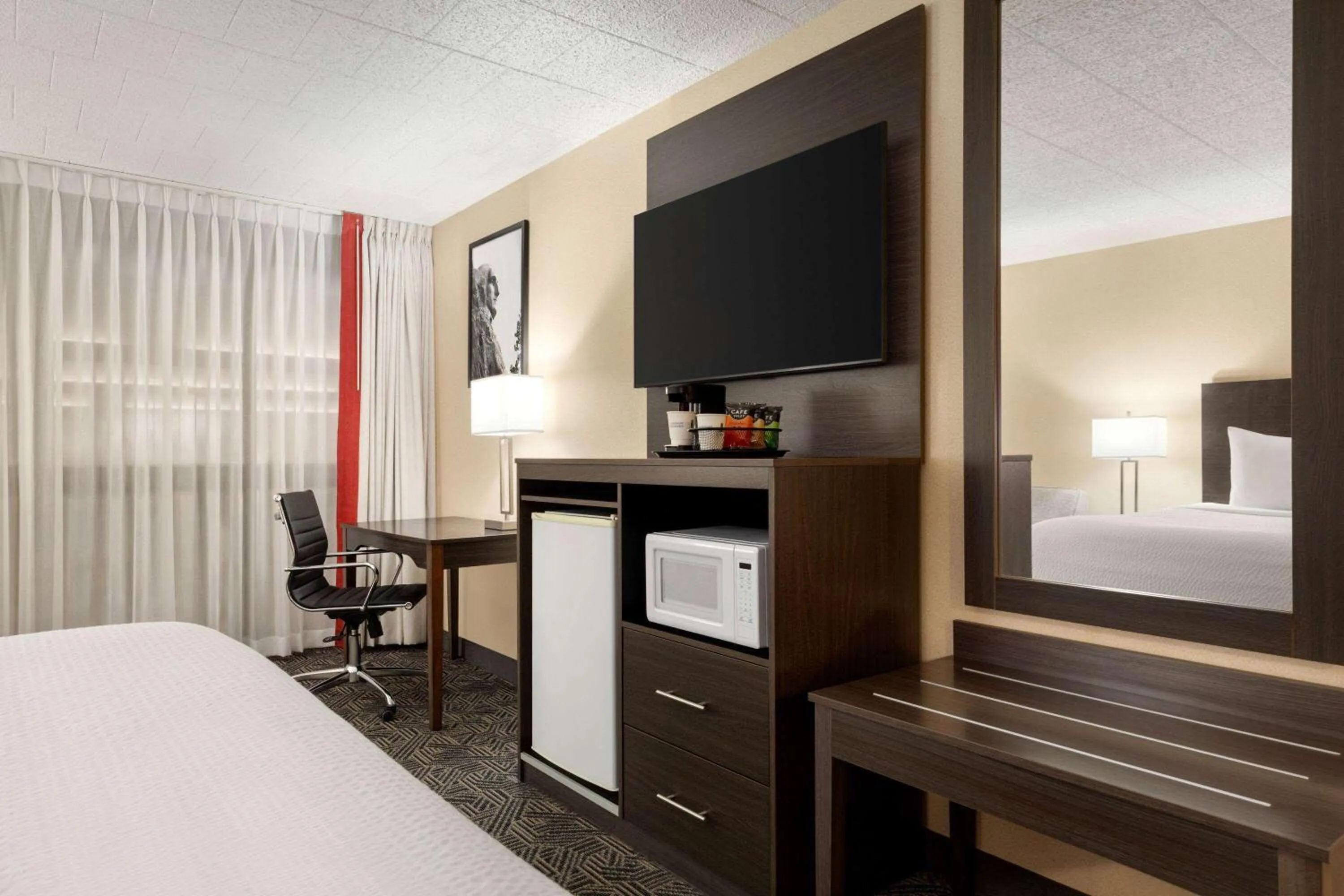 Photo of the whole room, Bed in Ramada by Wyndham Alpena