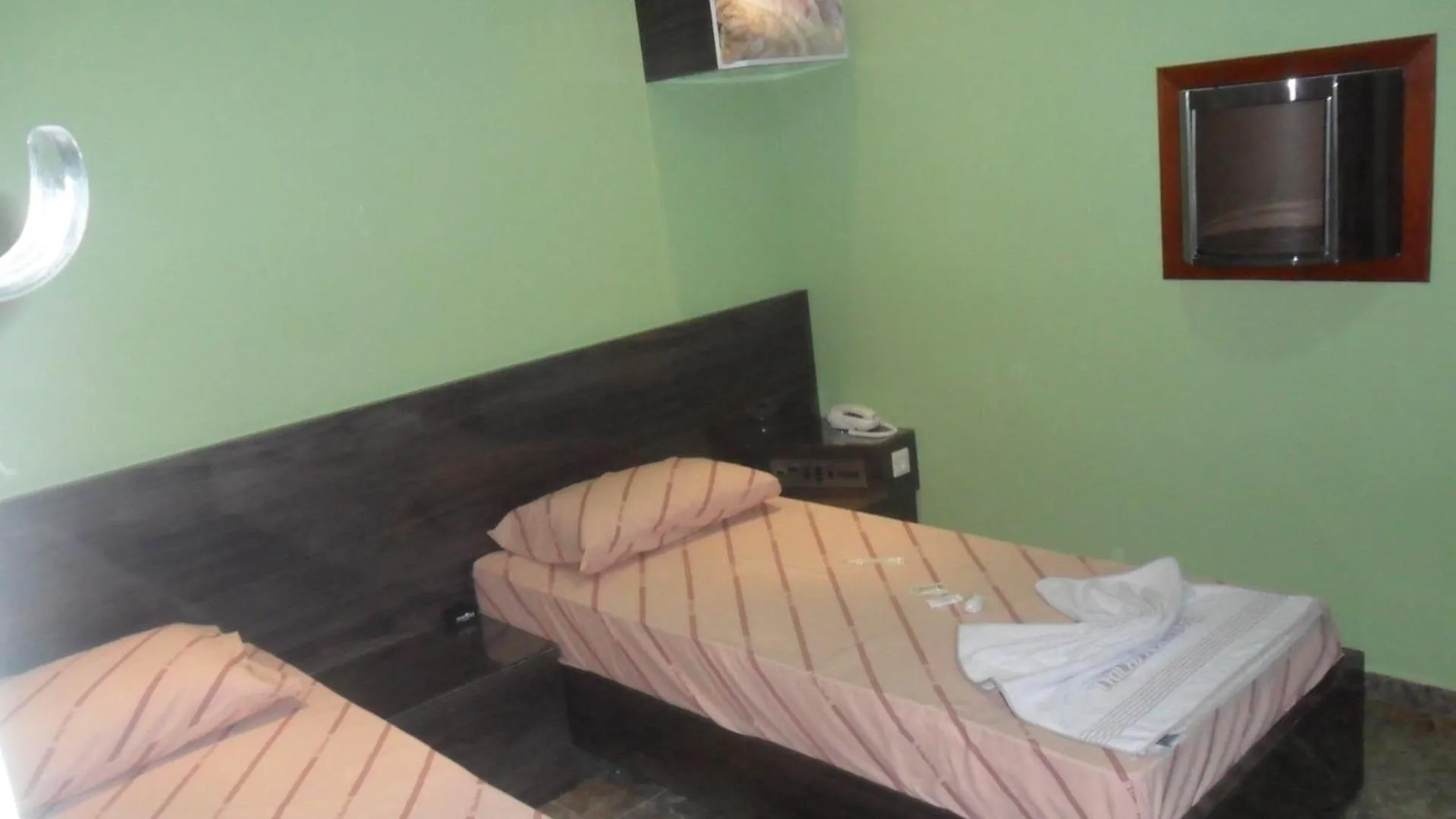 Bed in Trilhos Hotel