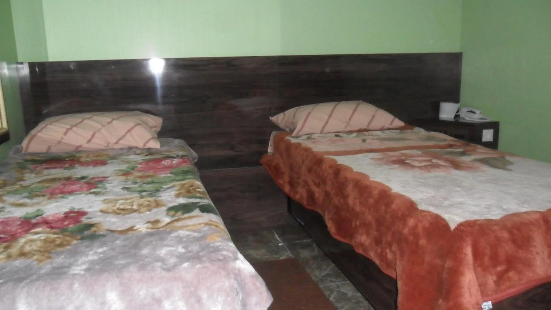 Bed in Trilhos Hotel