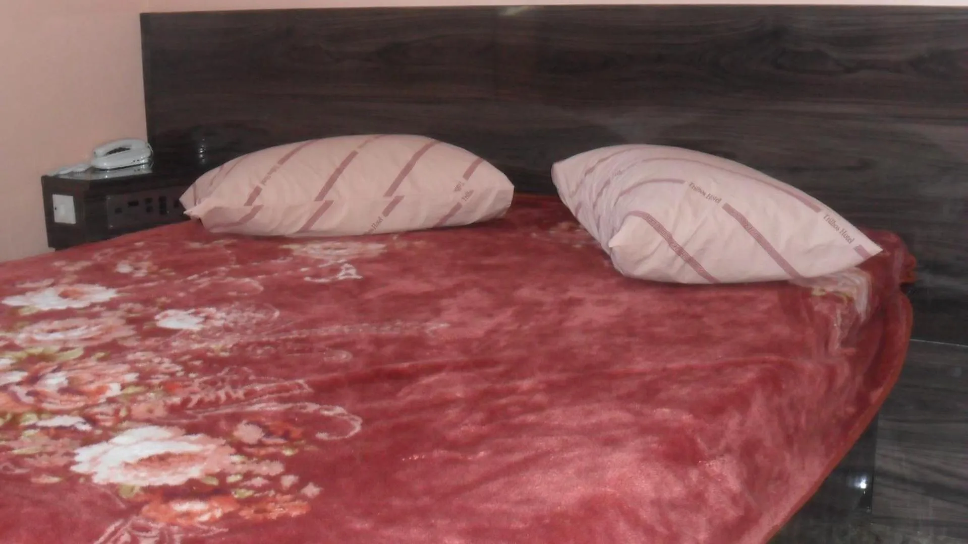 Bed in Trilhos Hotel