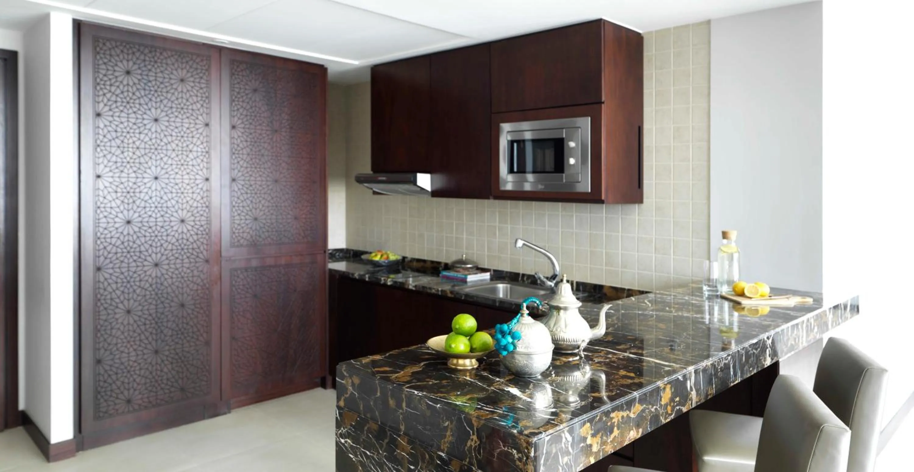 Kitchen or kitchenette in Bab Al Qasr Residence