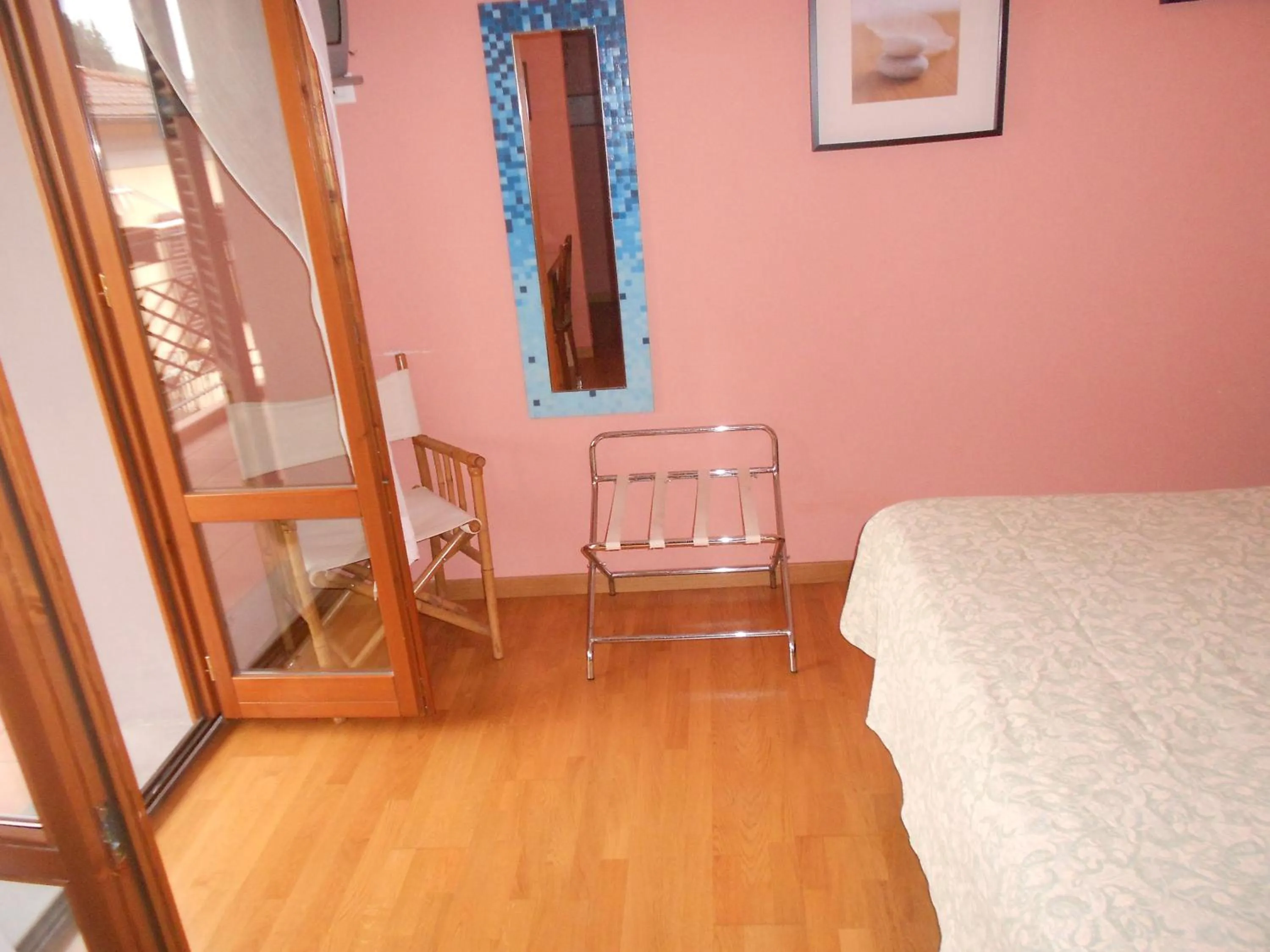 Bedroom in Albergo Casa Al Sole