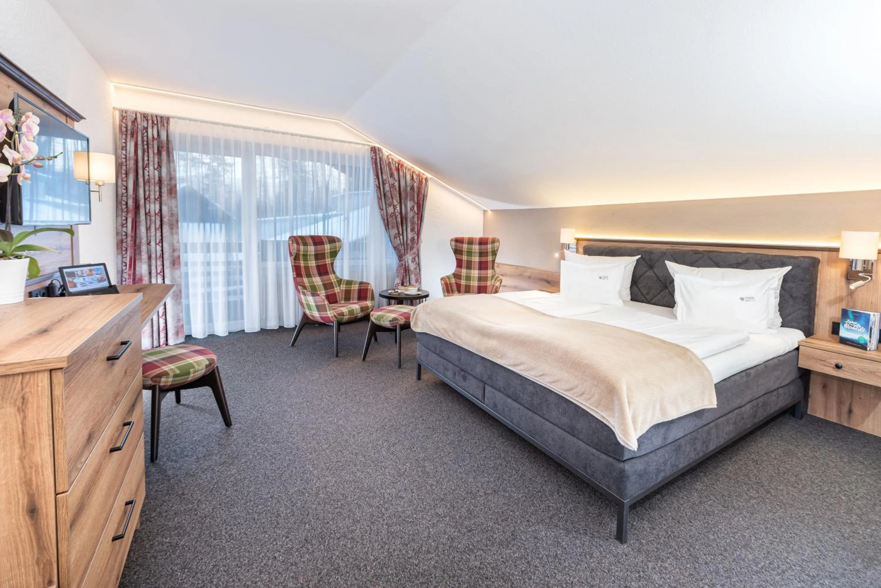 Photo of the whole room, Bed in Hotel Tyrol - Oberstaufen PLUS Partner