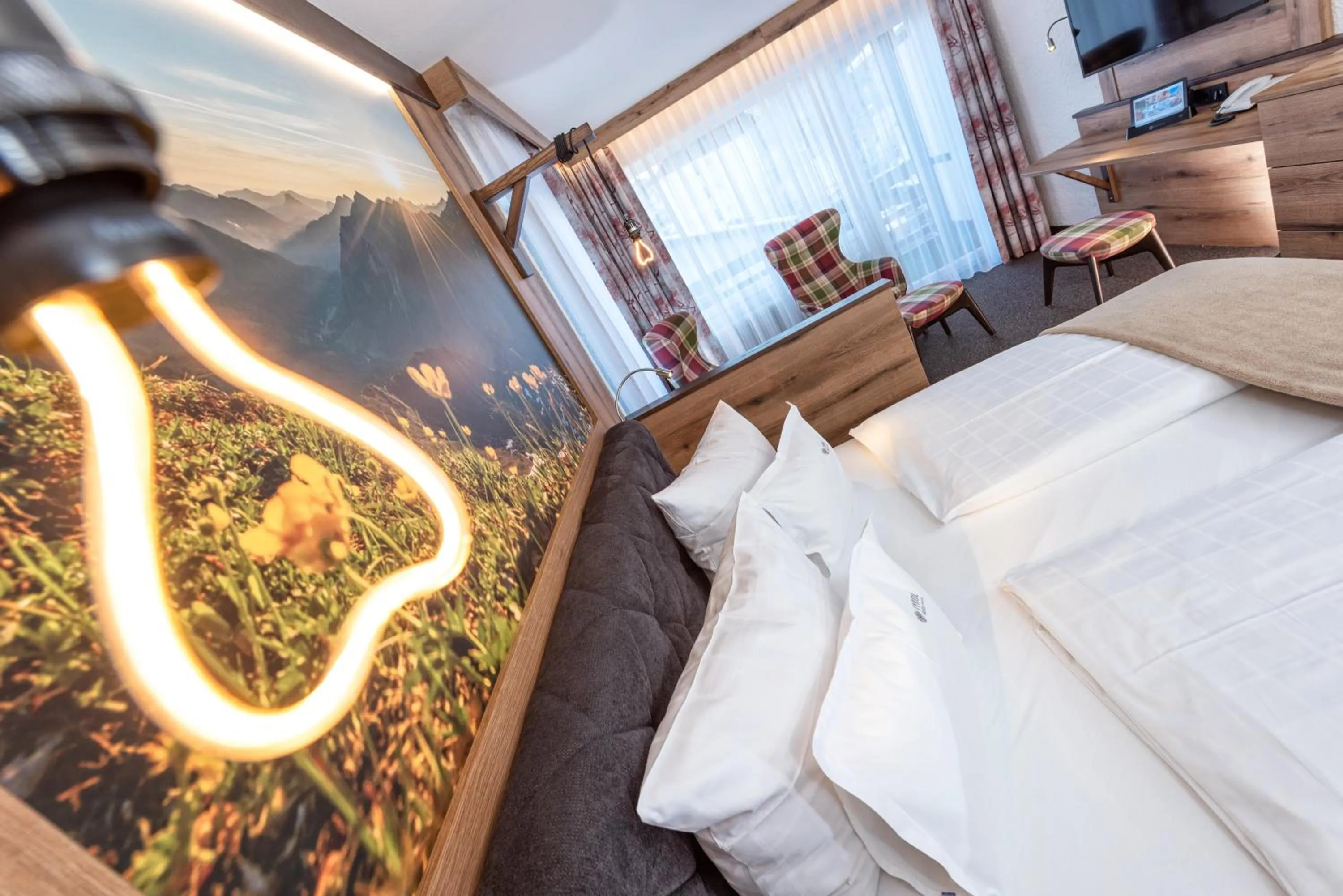 Photo of the whole room, Bed in Hotel Tyrol - Oberstaufen PLUS Partner