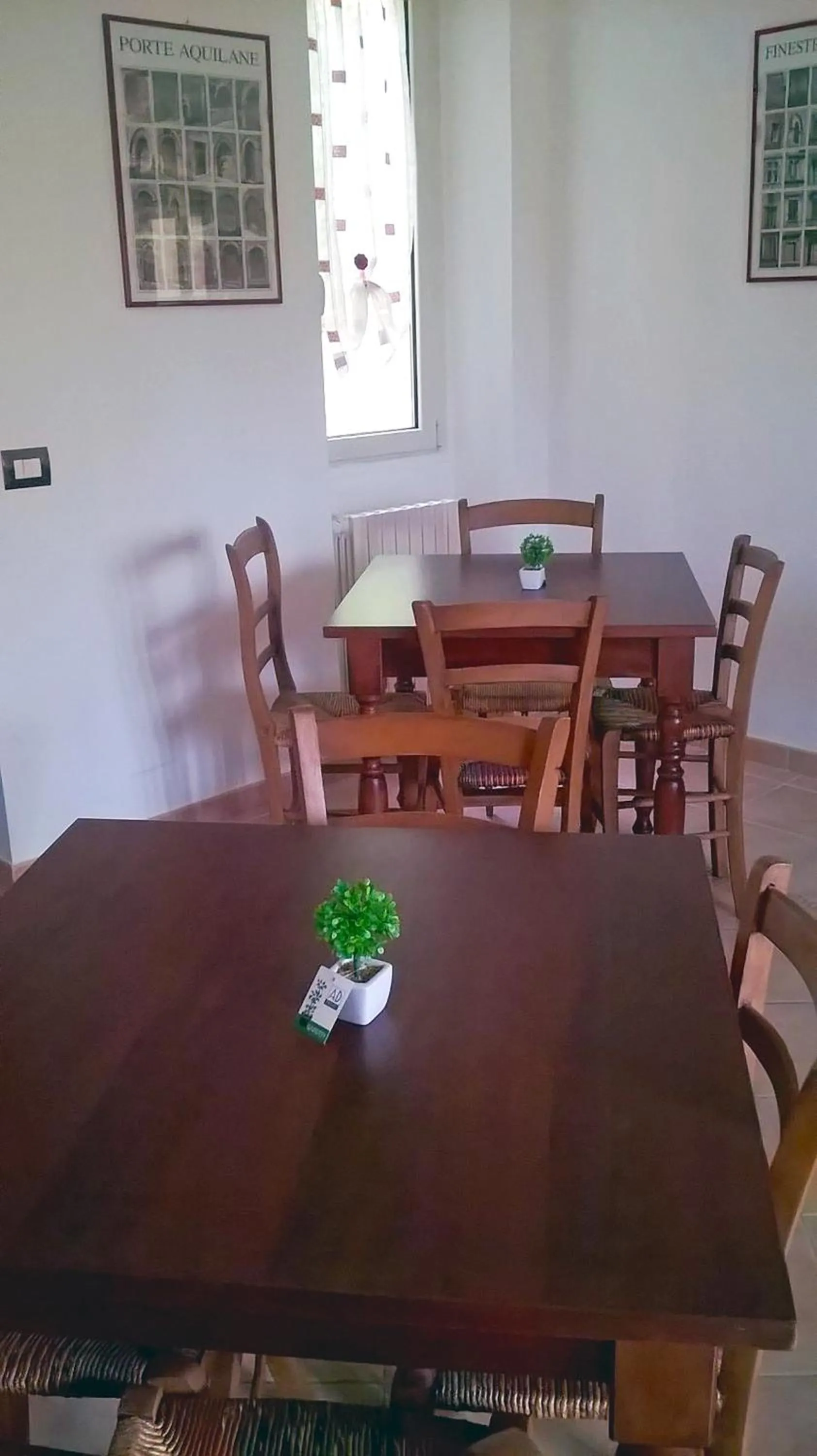 Communal lounge/ TV room in B&B Porta Bazzano