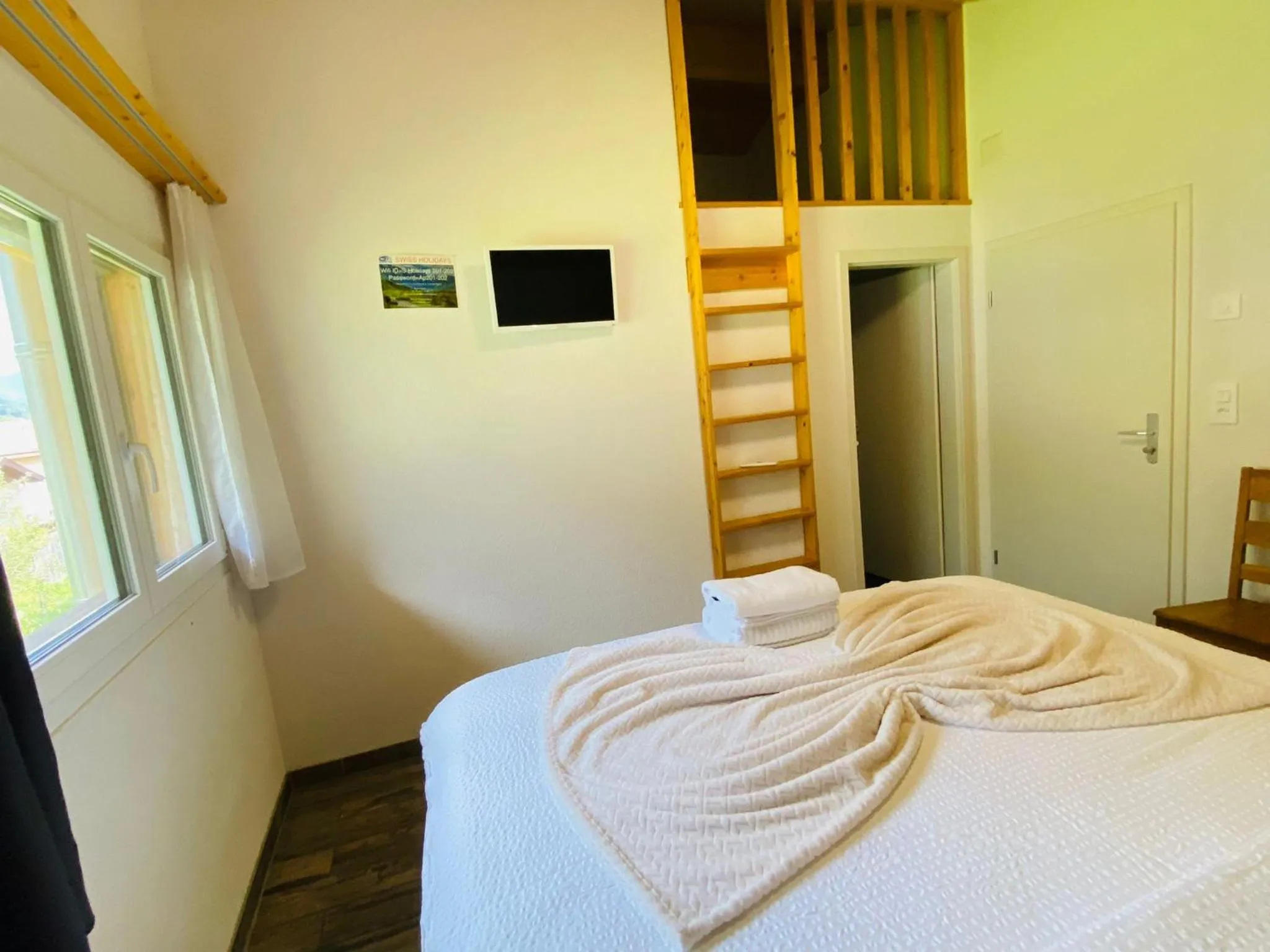 Bed in Swiss Chalet Holidays Ringgenberg