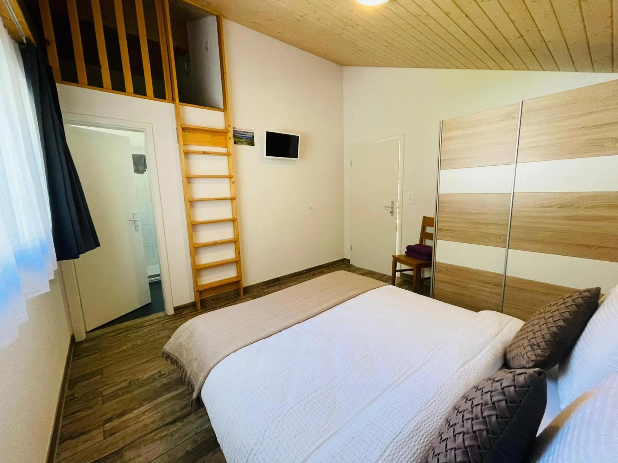 Bed in Swiss Chalet Holidays Ringgenberg