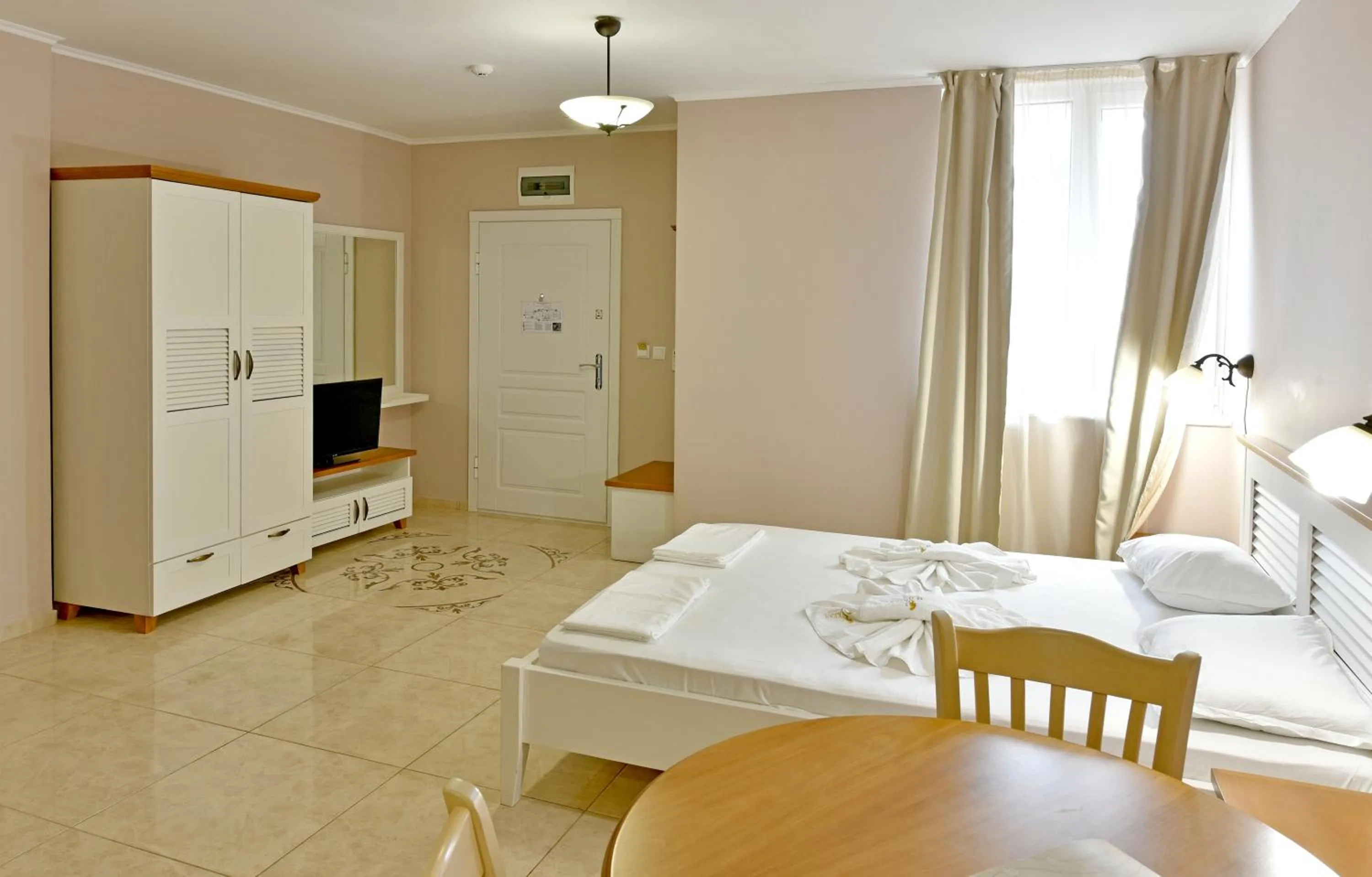 Bed in Sirena Palace Family Hotel