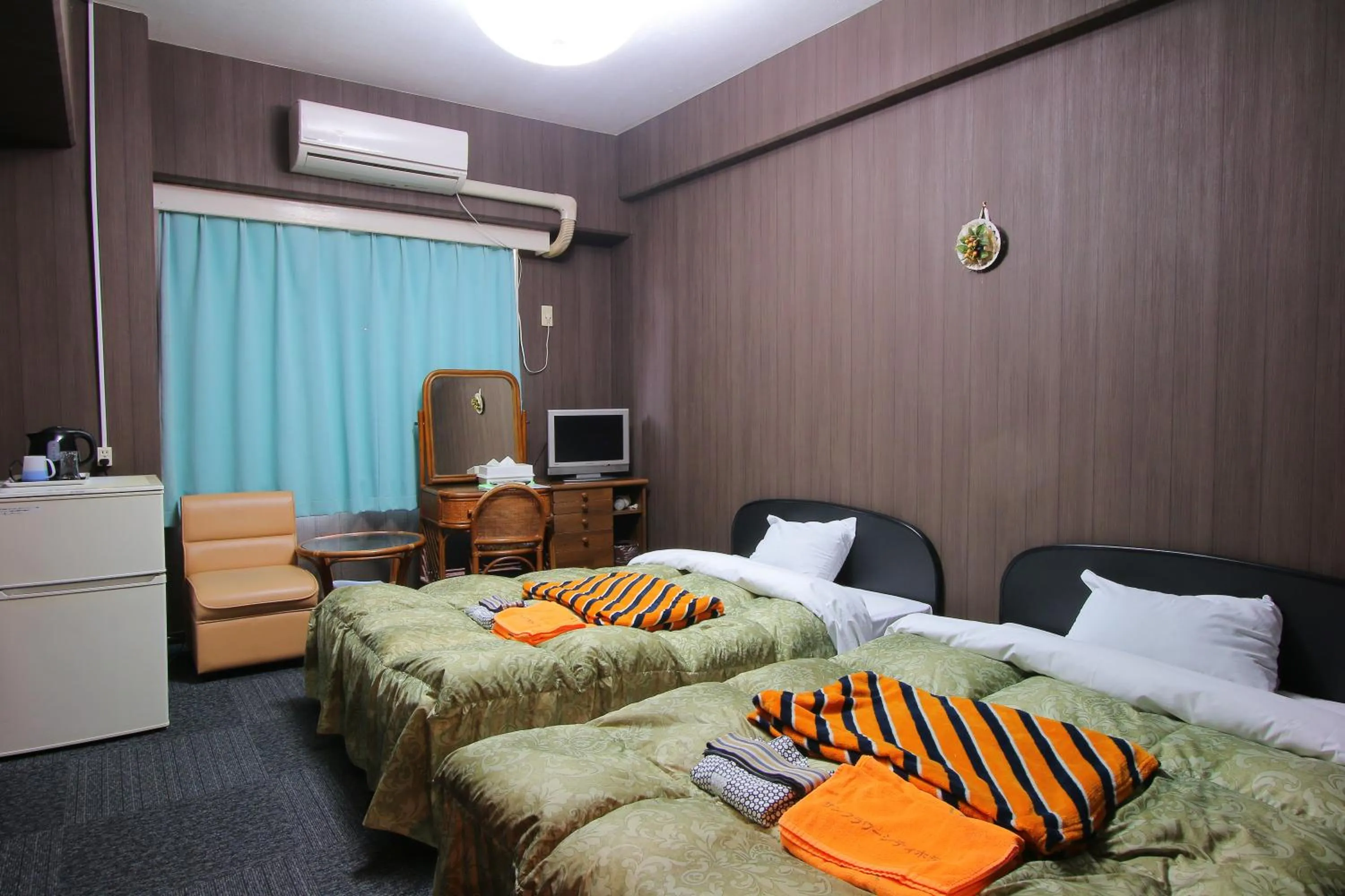 Bed in Sun Flower City Hotel