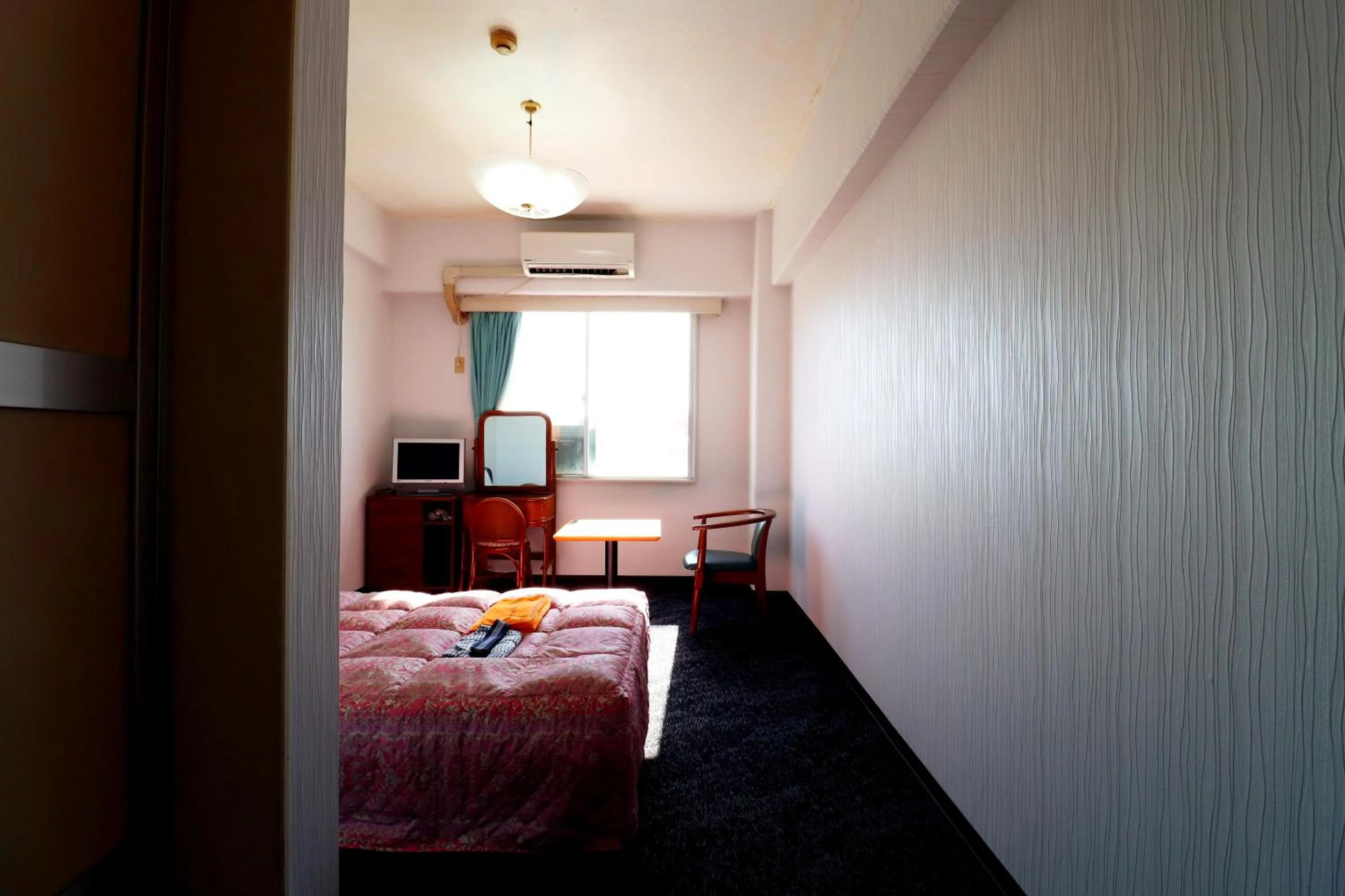 Bed in Sun Flower City Hotel