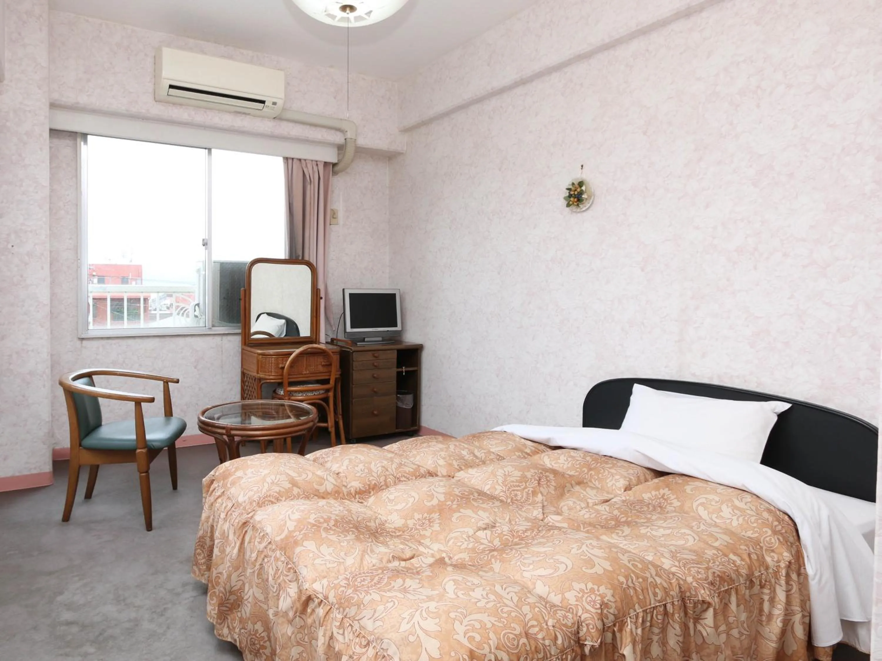 Bed in Sun Flower City Hotel