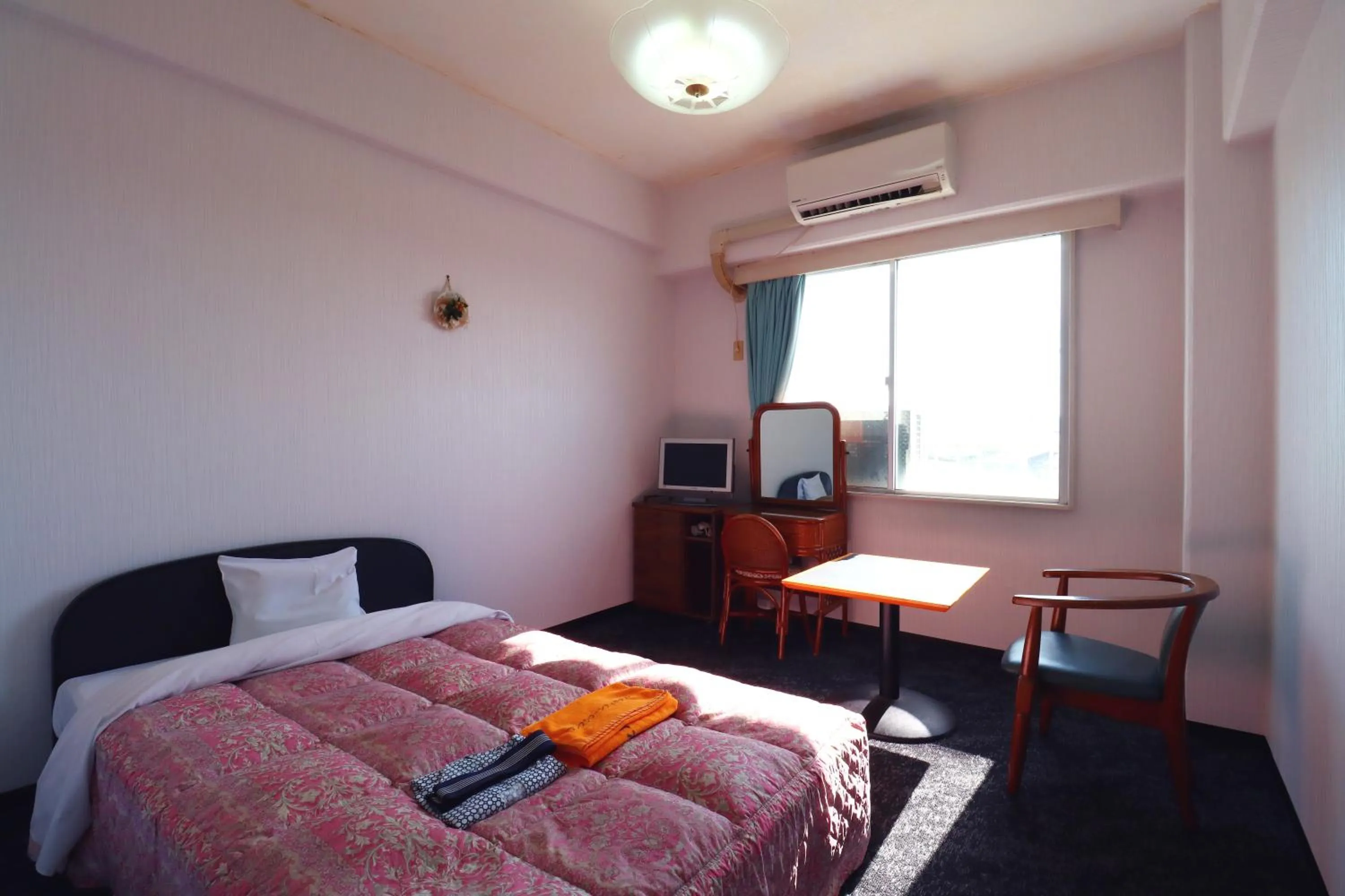 Bed in Sun Flower City Hotel