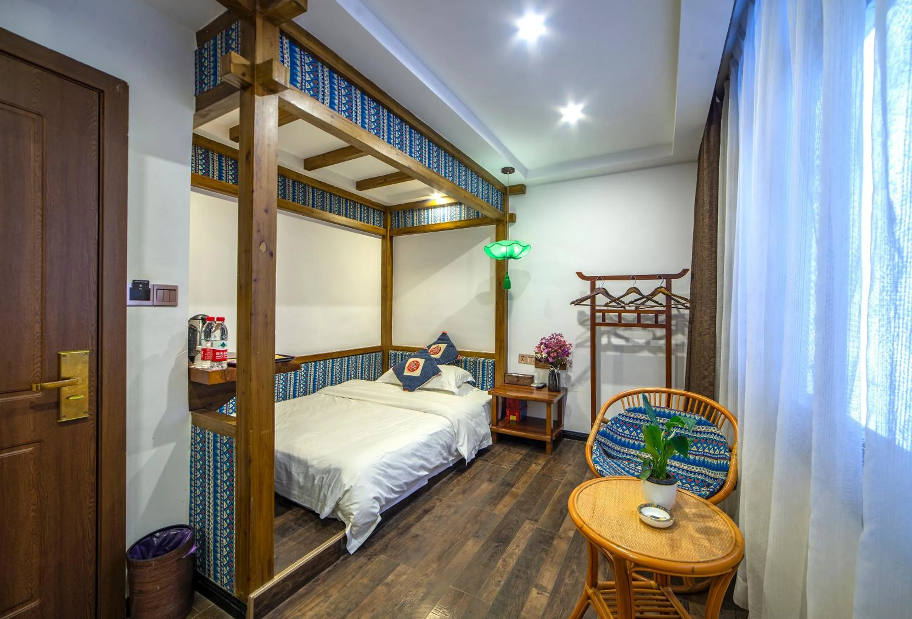 Photo of the whole room, Bed in Zhangjiajie Highlights Guesthouse