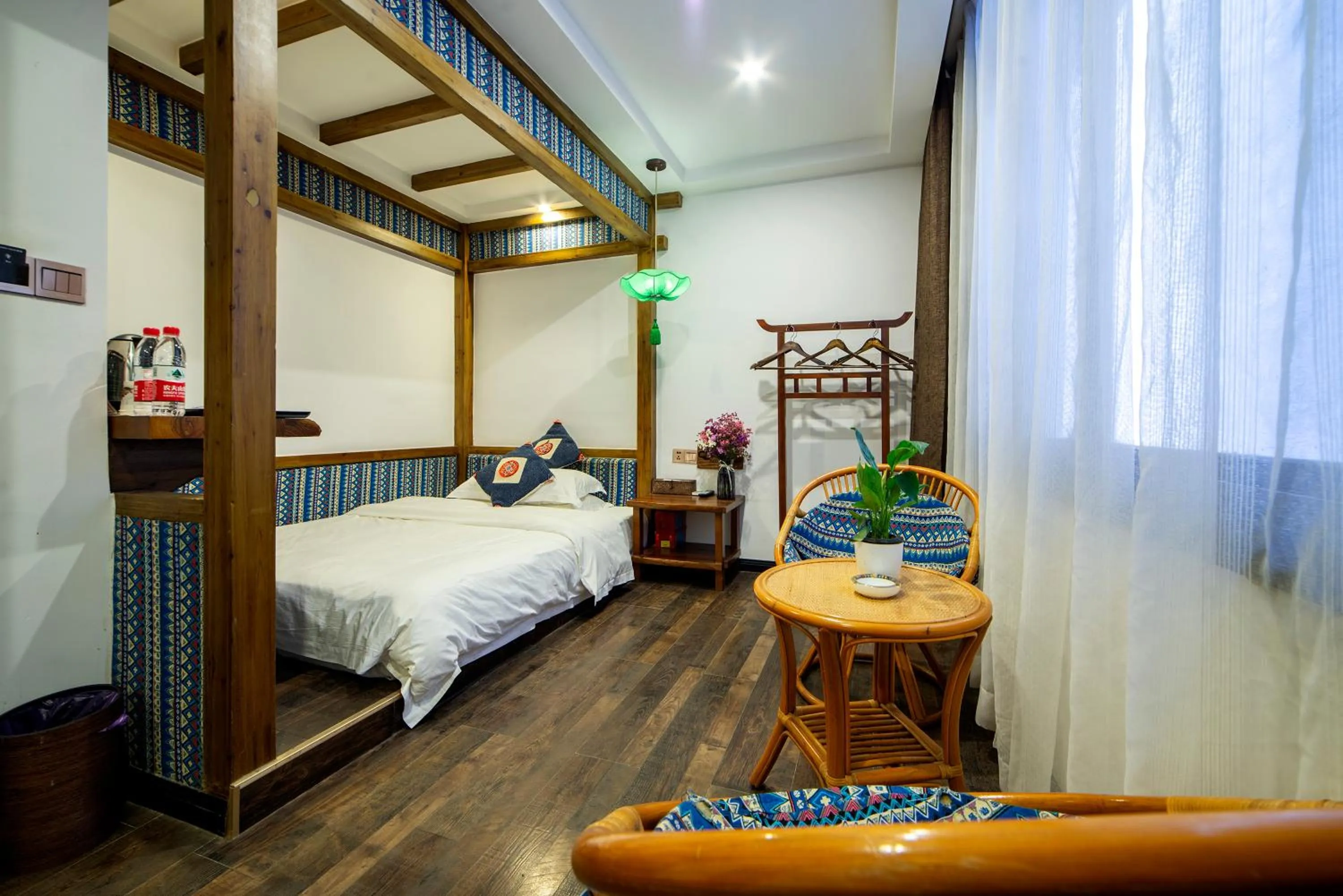 Photo of the whole room, Bed in Zhangjiajie Highlights Guesthouse