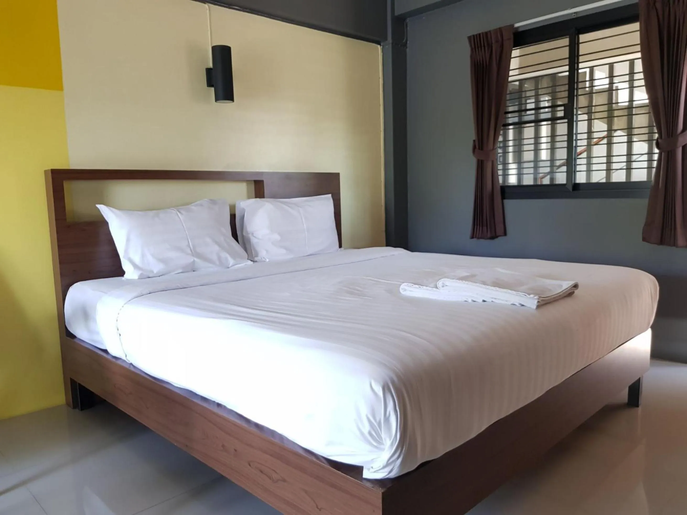 Photo of the whole room, Bed in Elite Residence Phitsanulok SHA