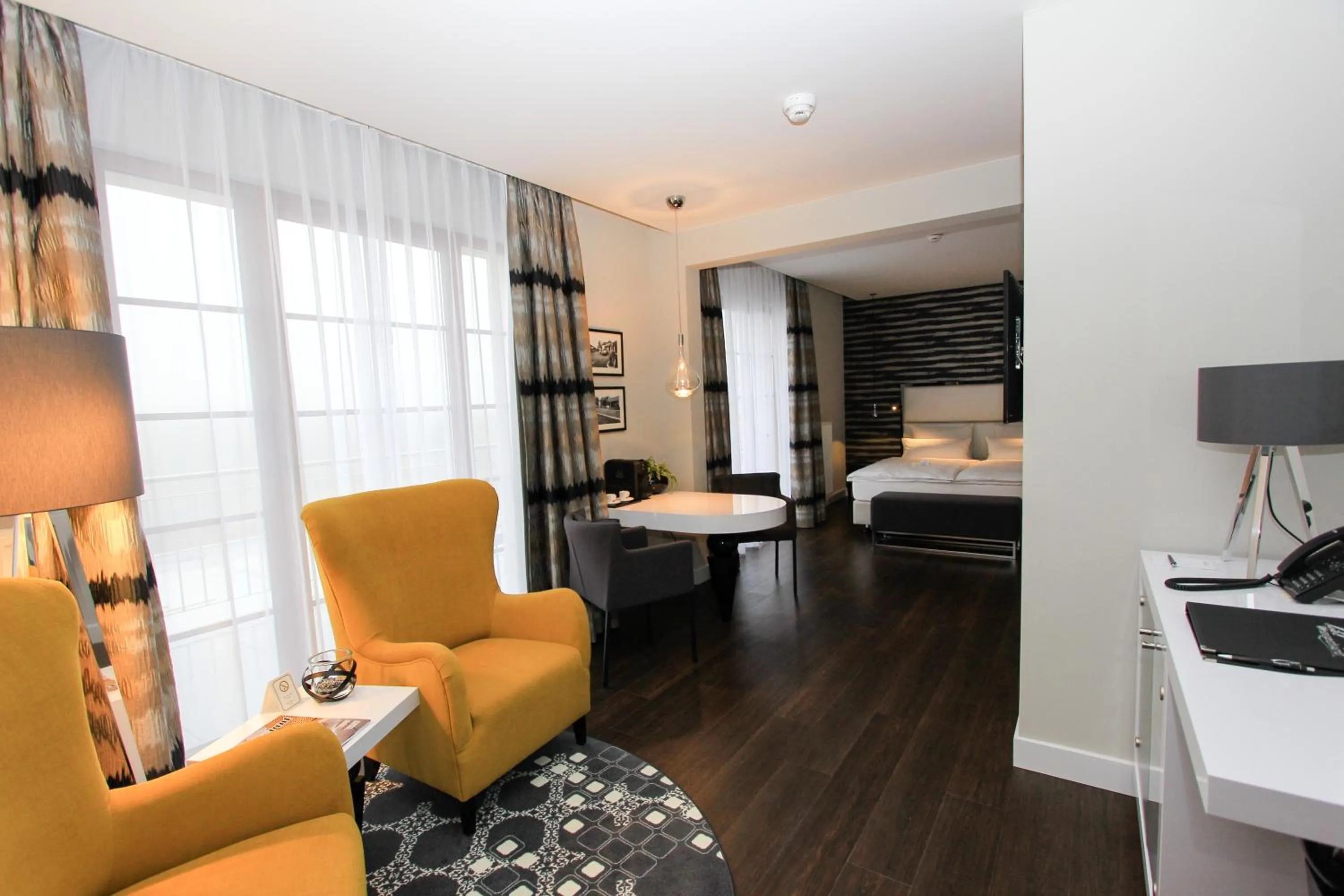 Seating area, Bed in Hotel Wemperhardt