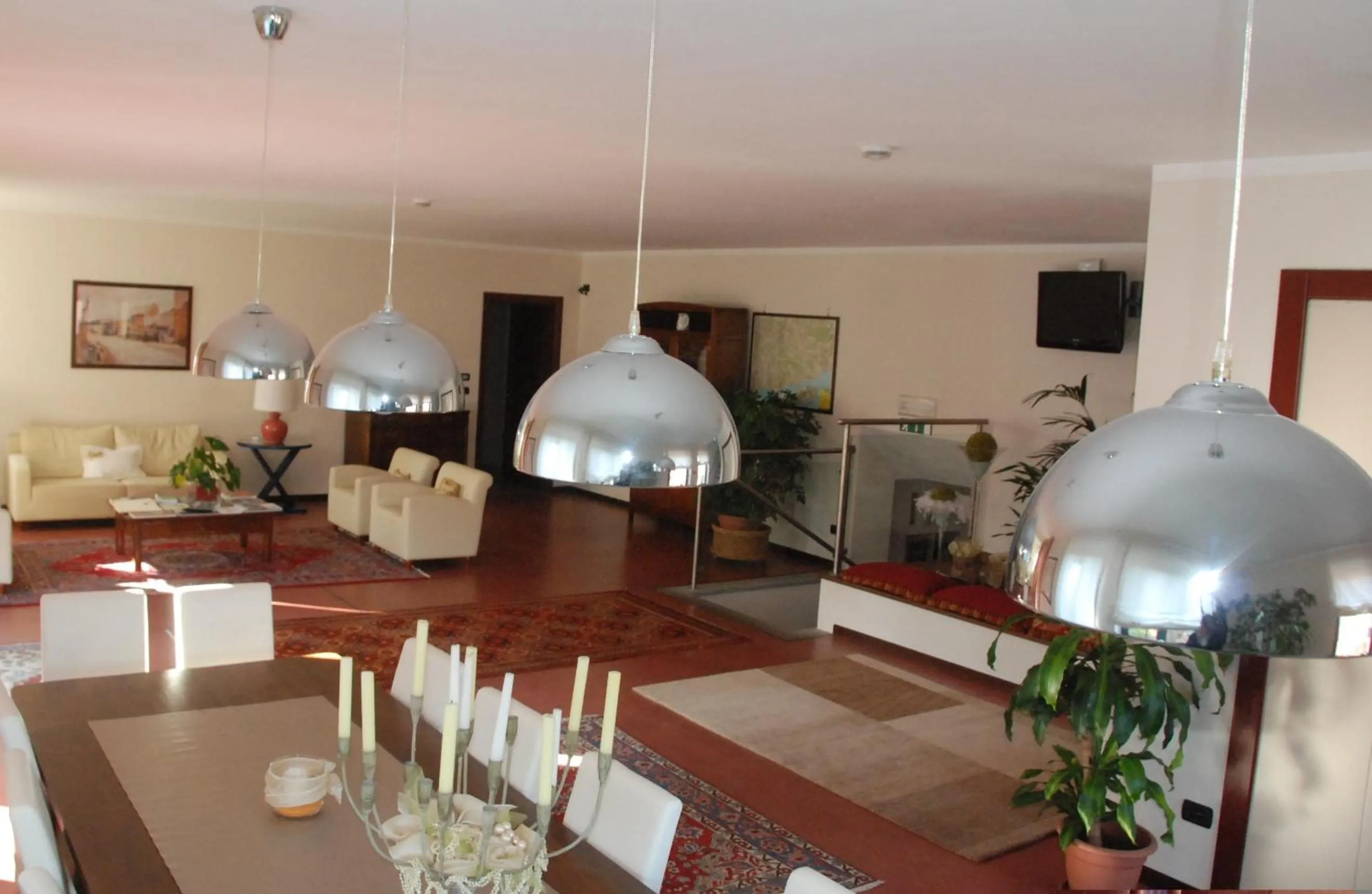 Communal lounge/ TV room in Albergo della Ceramica