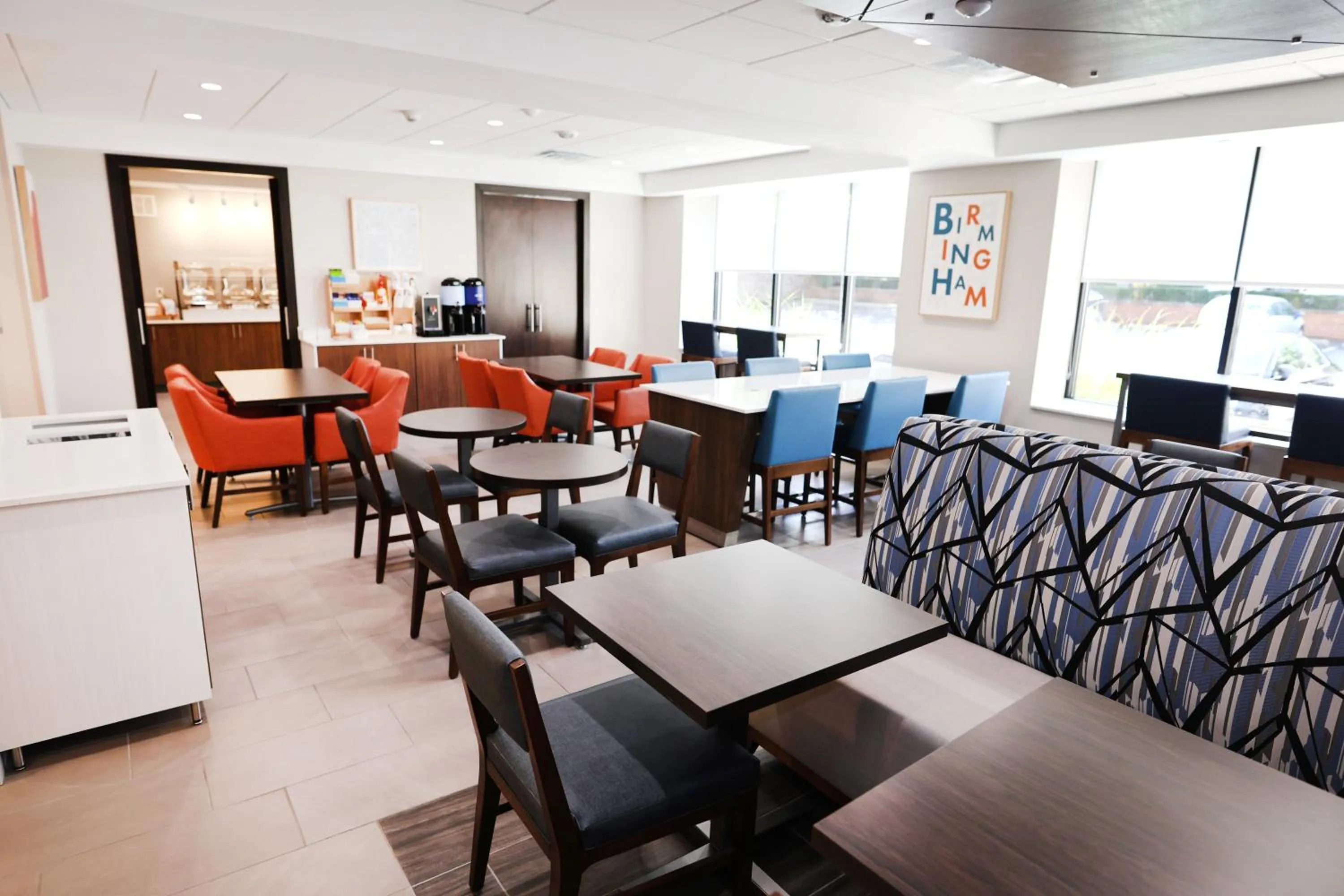 Dining area in Holiday Inn Express Detroit-Birmingham by IHG