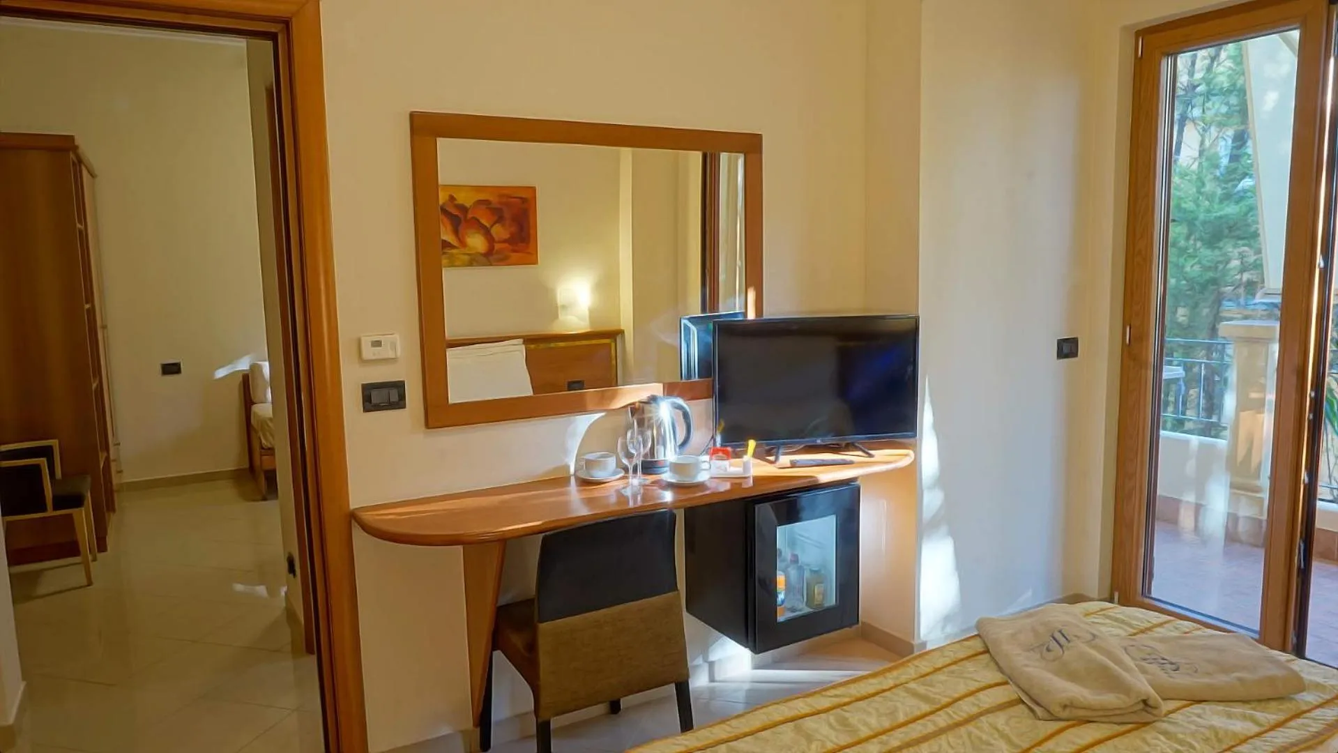 Communal lounge/ TV room, Bed in Hotel Residence Piccolo