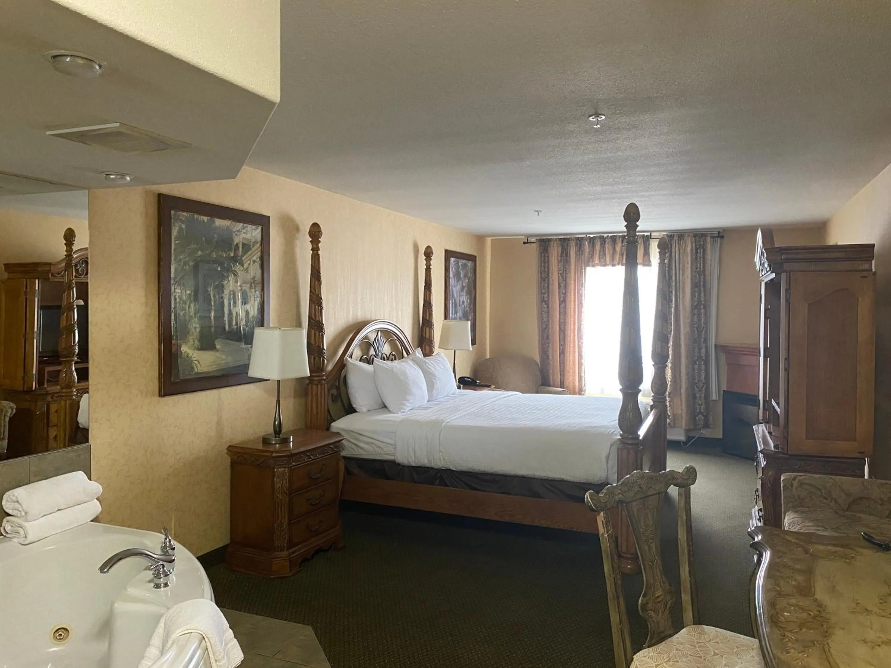 Photo of the whole room, Bed in Merit Hotel & Suites
