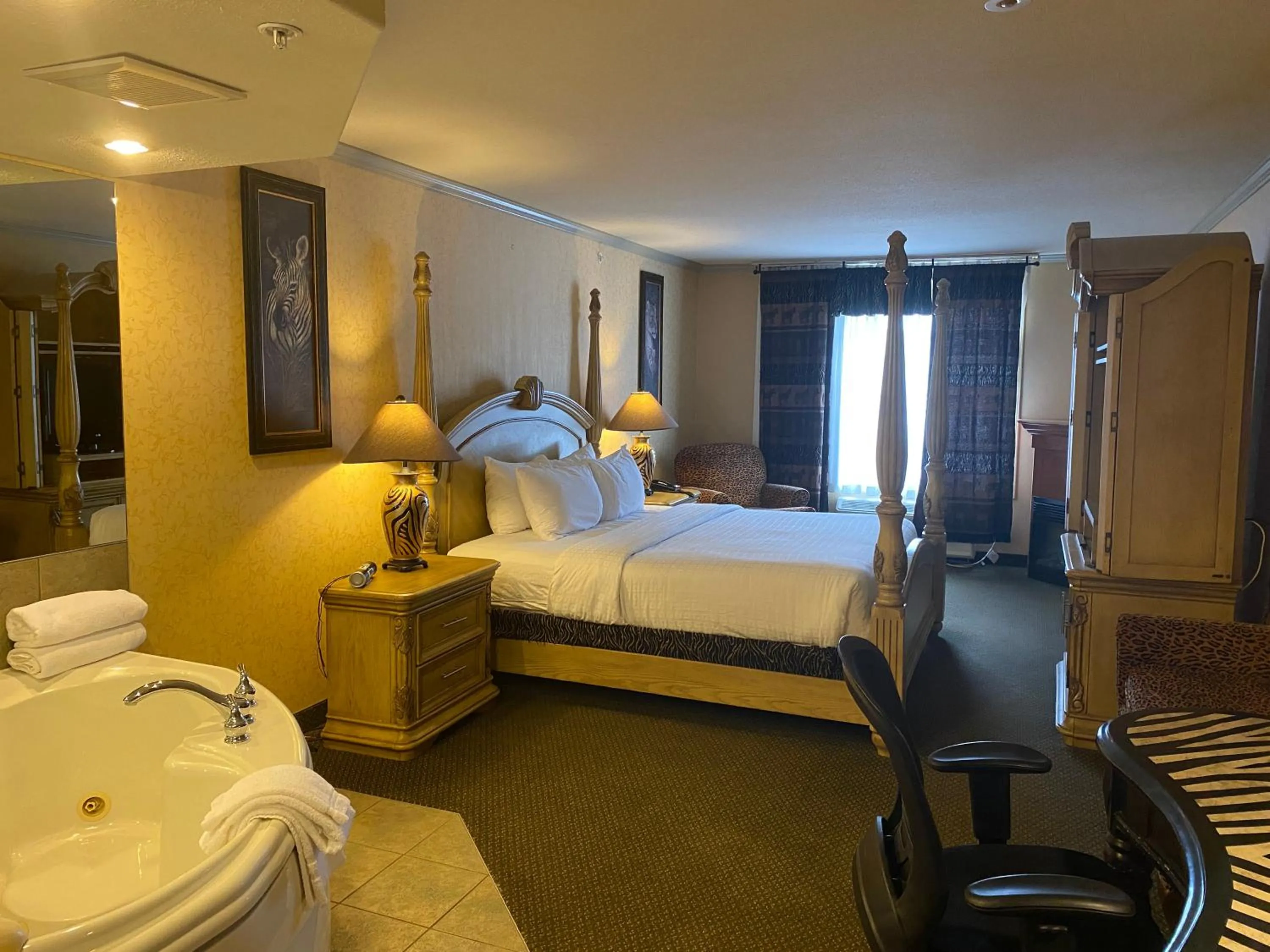 Photo of the whole room, Bed in Merit Hotel & Suites
