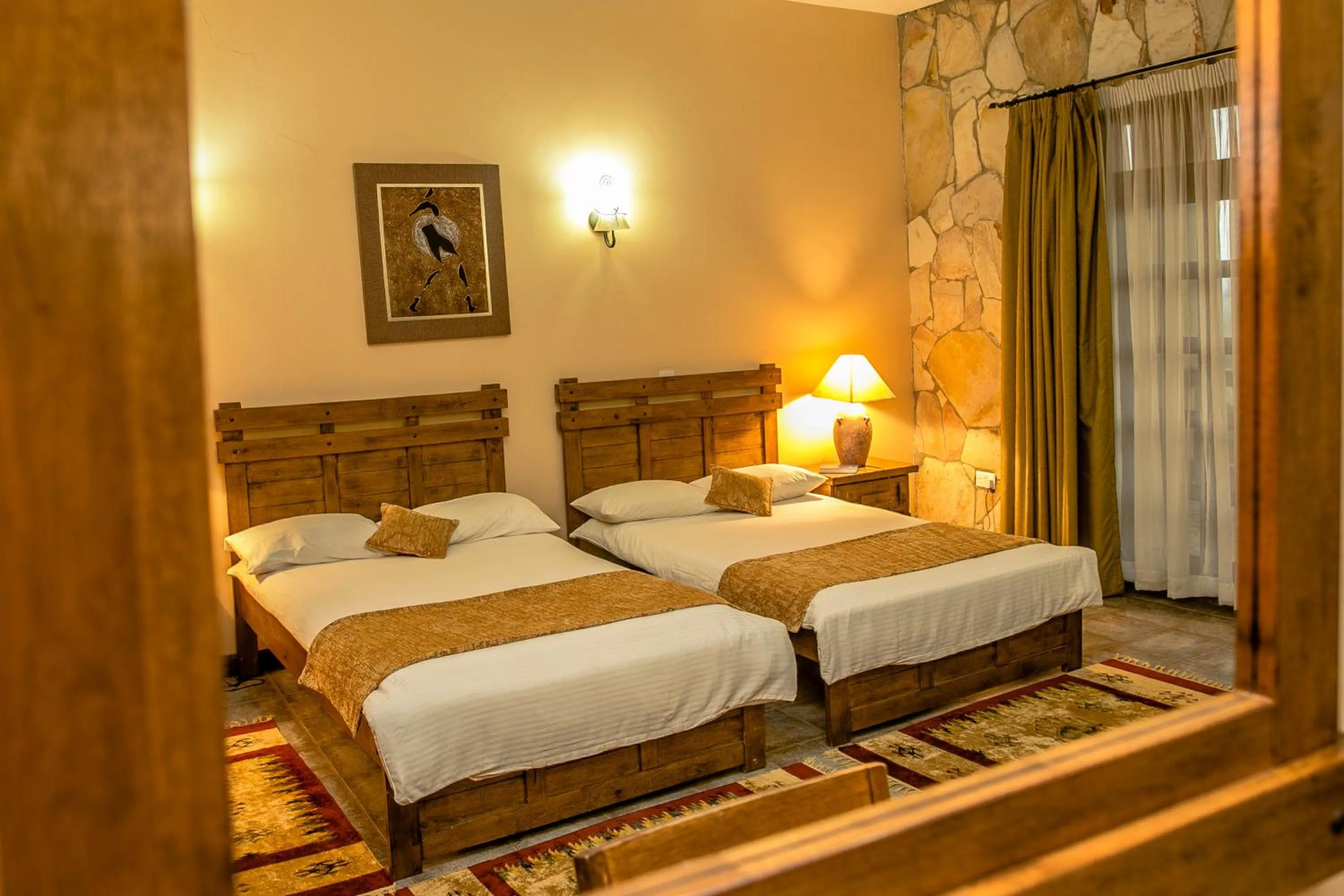 Bed in Mountains of the Moon Hotel Fort Portal