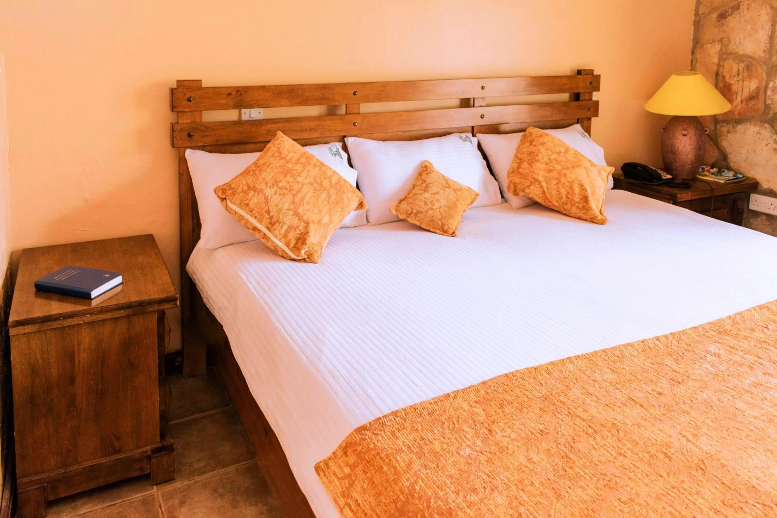 Bed in Mountains of the Moon Hotel Fort Portal