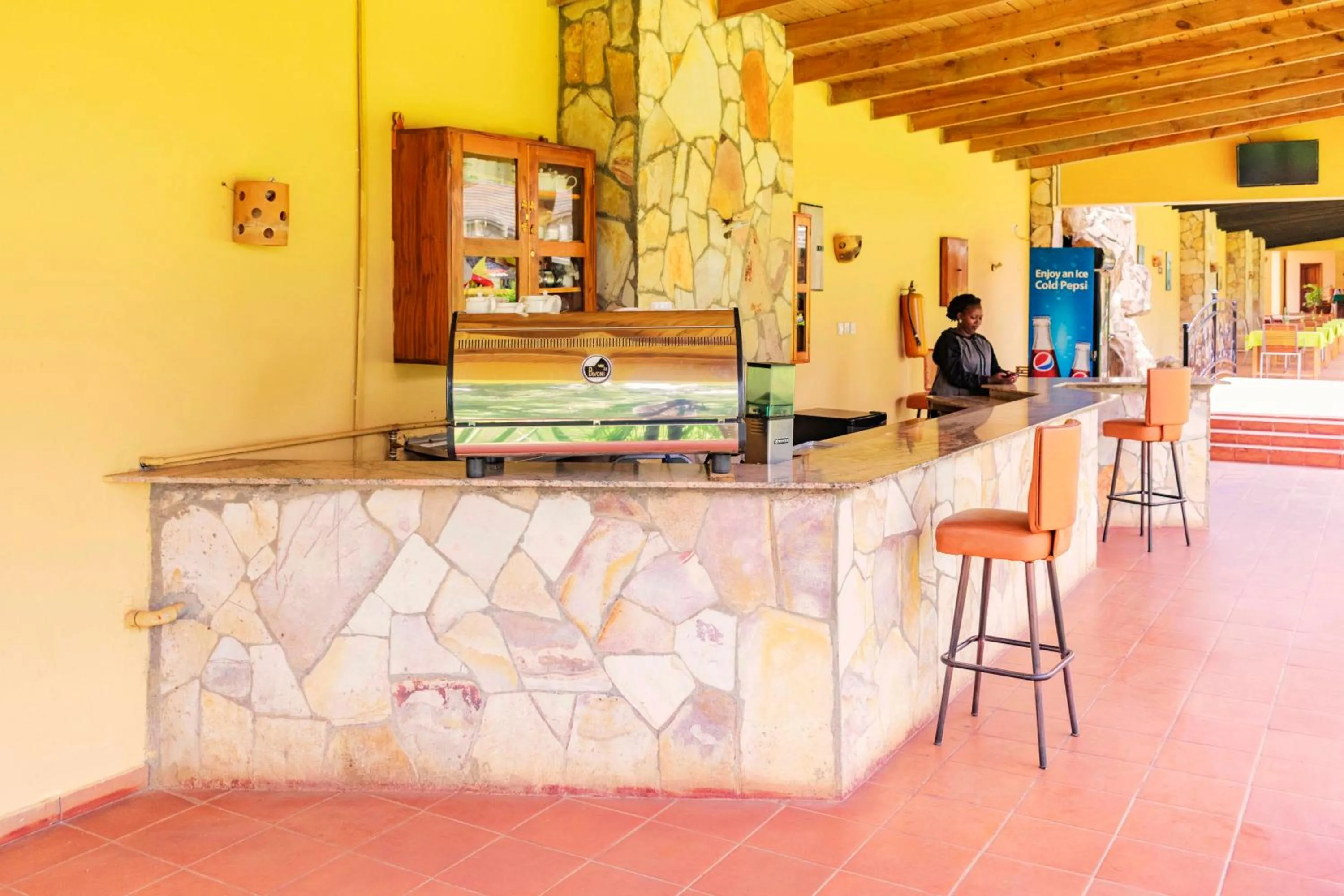 Staff in Mountains of the Moon Hotel Fort Portal