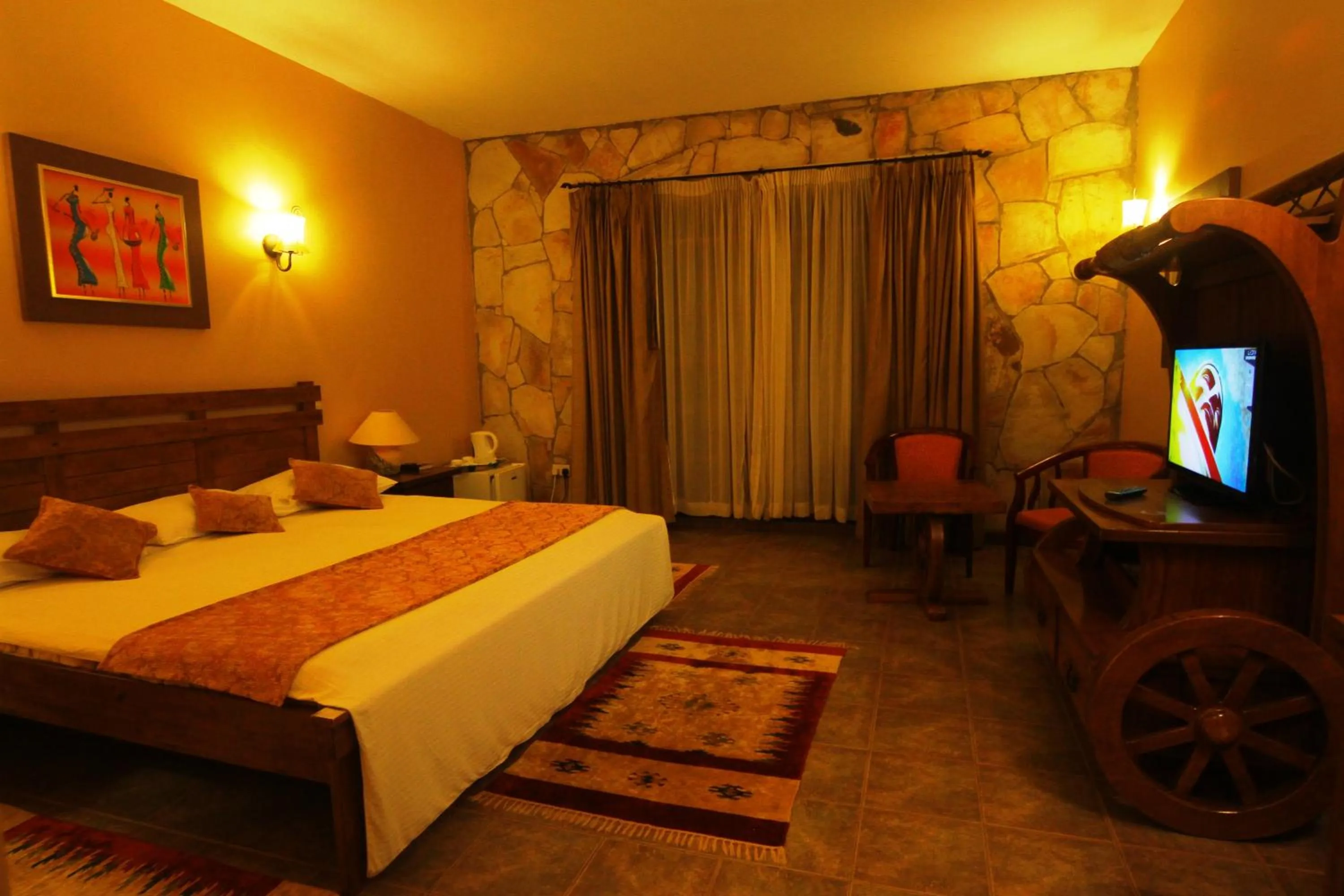 Bed in Mountains of the Moon Hotel Fort Portal