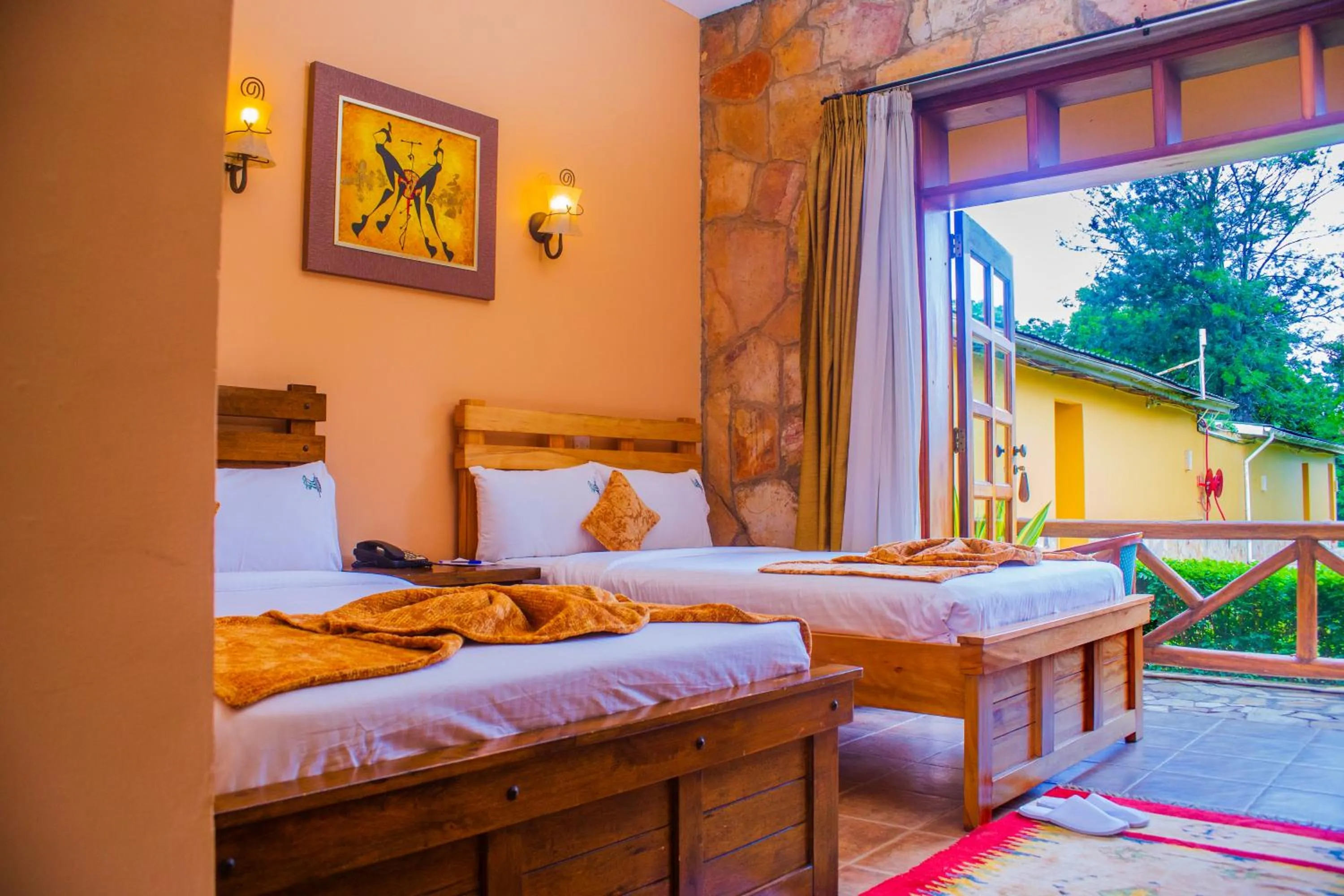 Bed in Mountains of the Moon Hotel Fort Portal