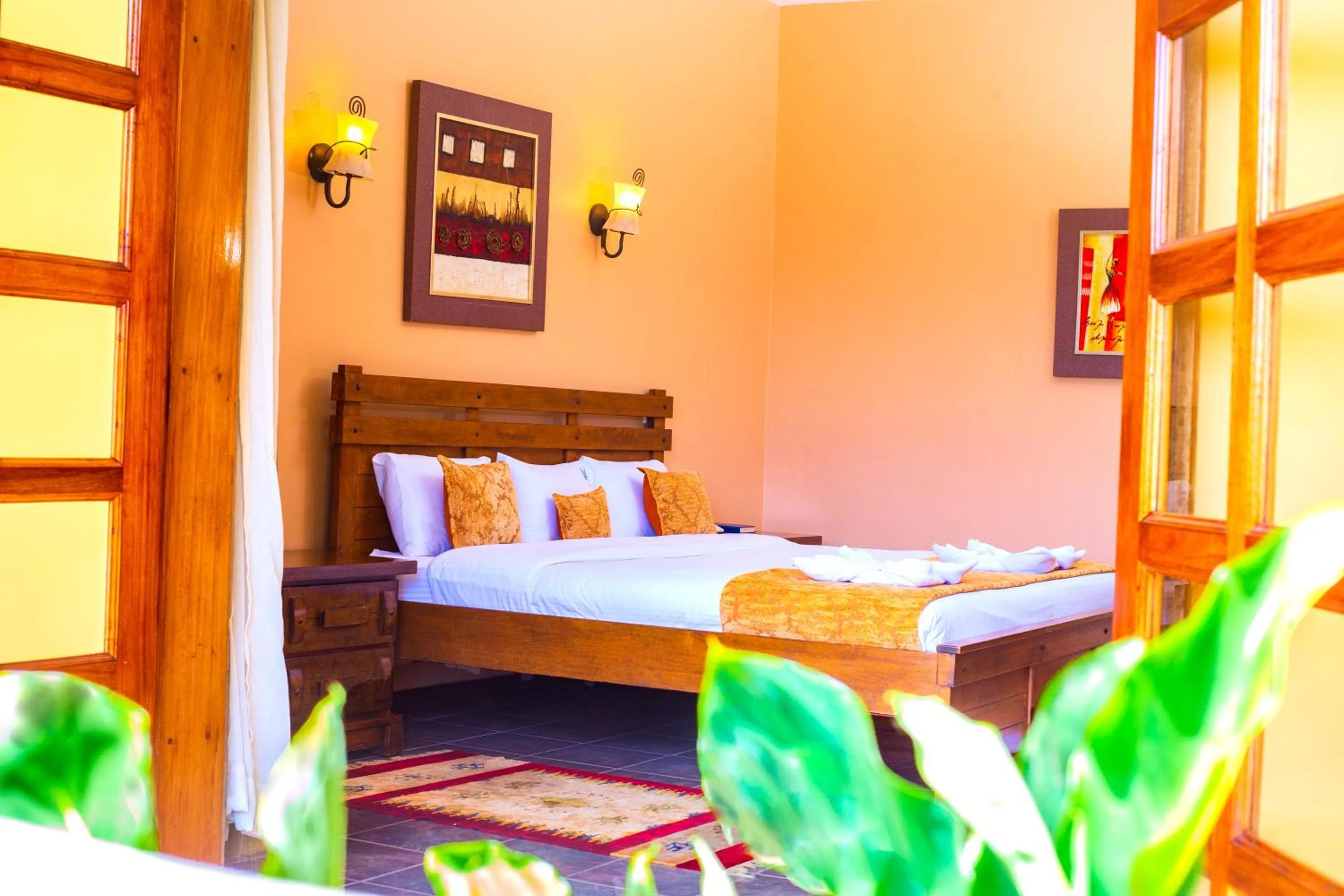 Bed in Mountains of the Moon Hotel Fort Portal