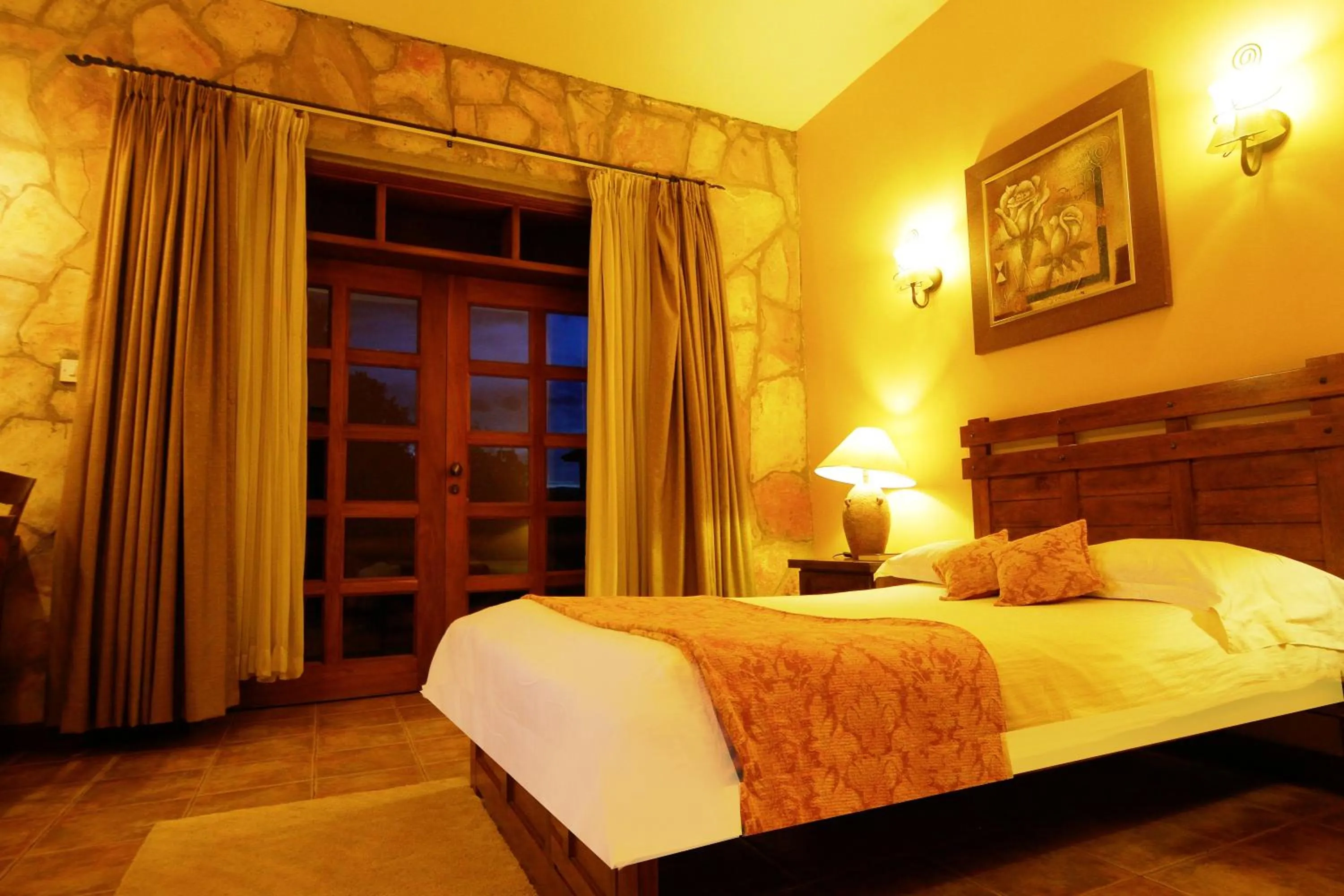 Bed in Mountains of the Moon Hotel Fort Portal