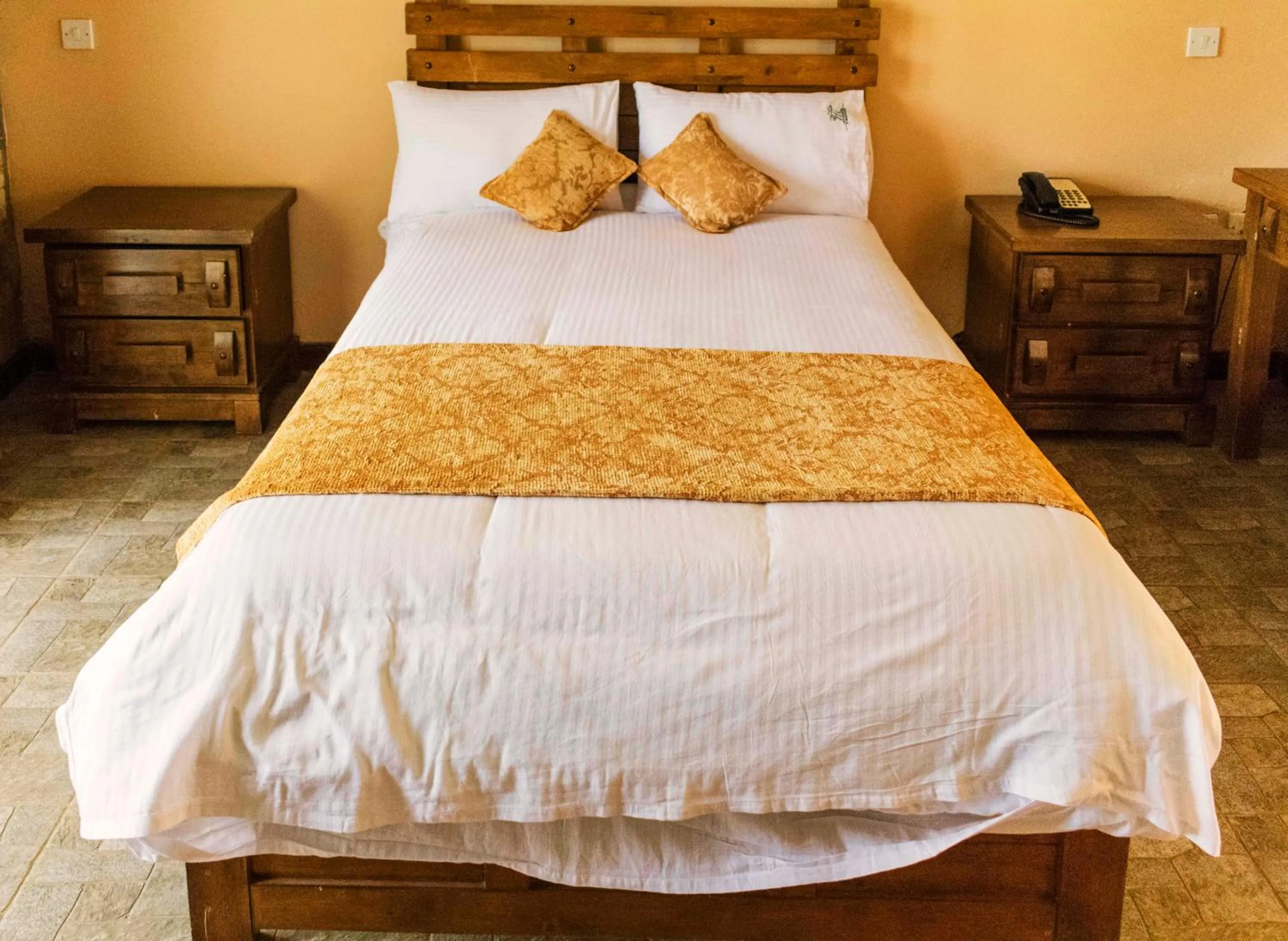 Bed in Mountains of the Moon Hotel Fort Portal