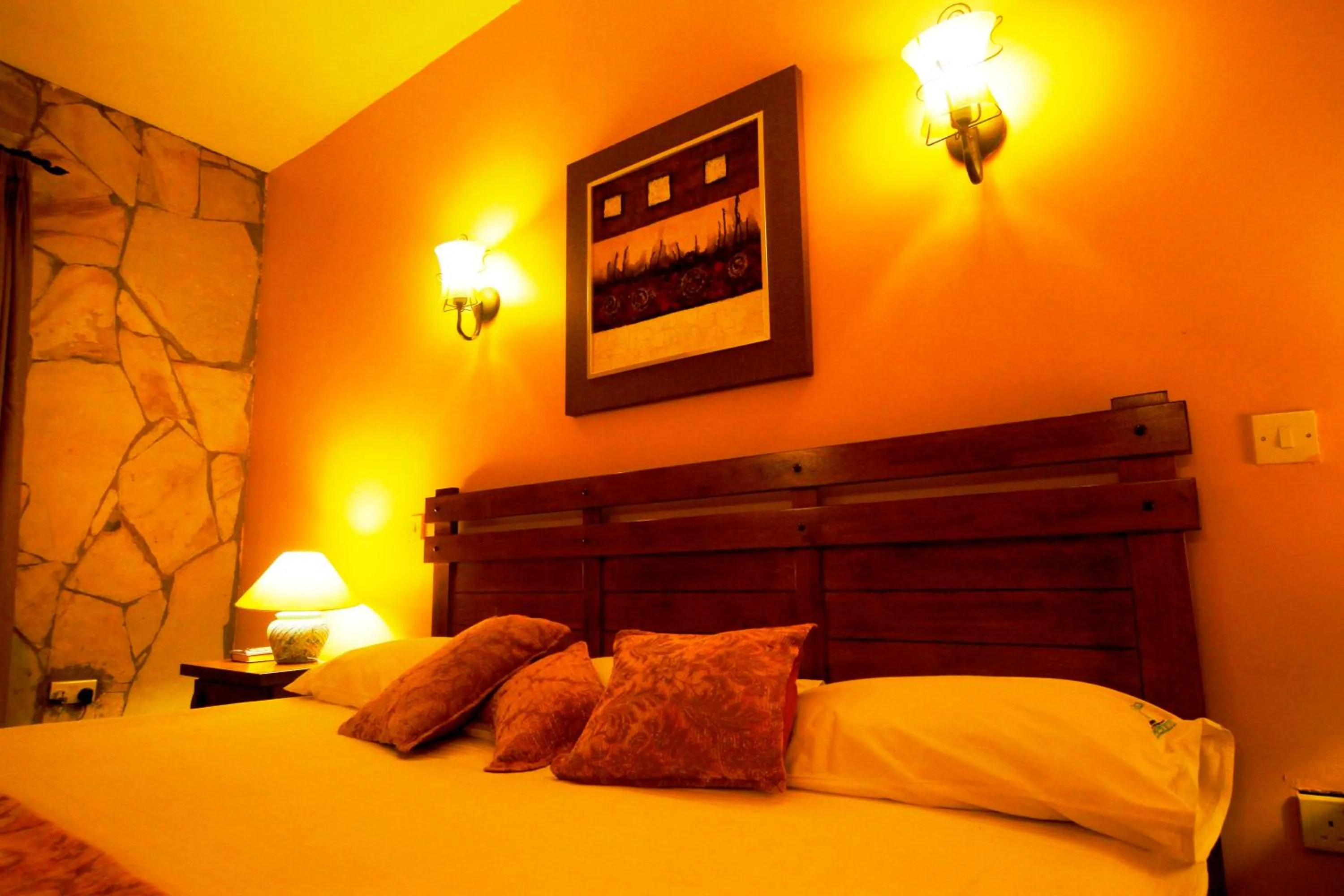 Bed in Mountains of the Moon Hotel Fort Portal