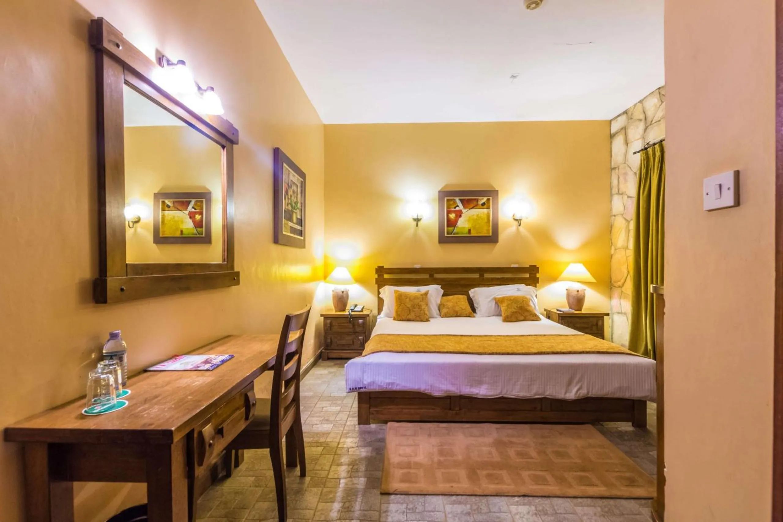 Bed in Mountains of the Moon Hotel Fort Portal