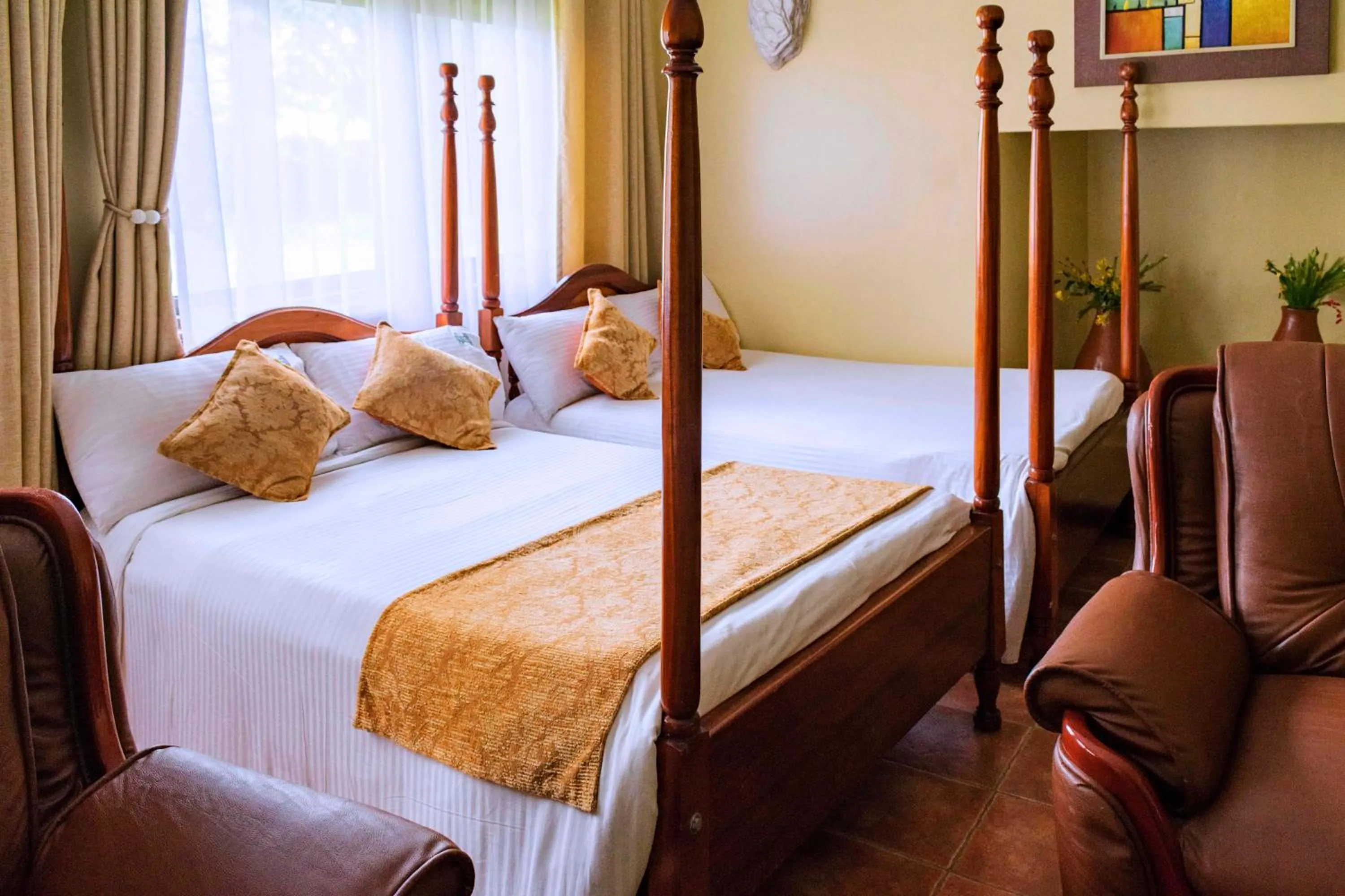 Bed in Mountains of the Moon Hotel Fort Portal
