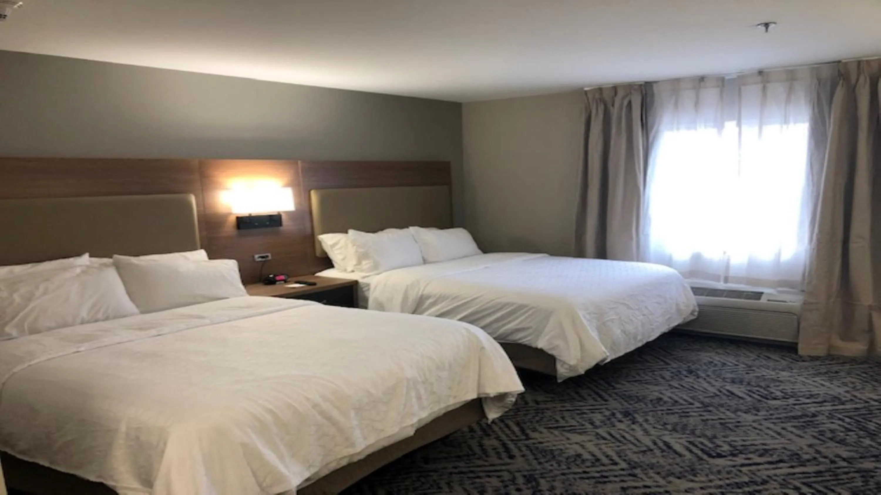 Photo of the whole room, Bed in Candlewood Suites Watertown Fort Drum by IHG