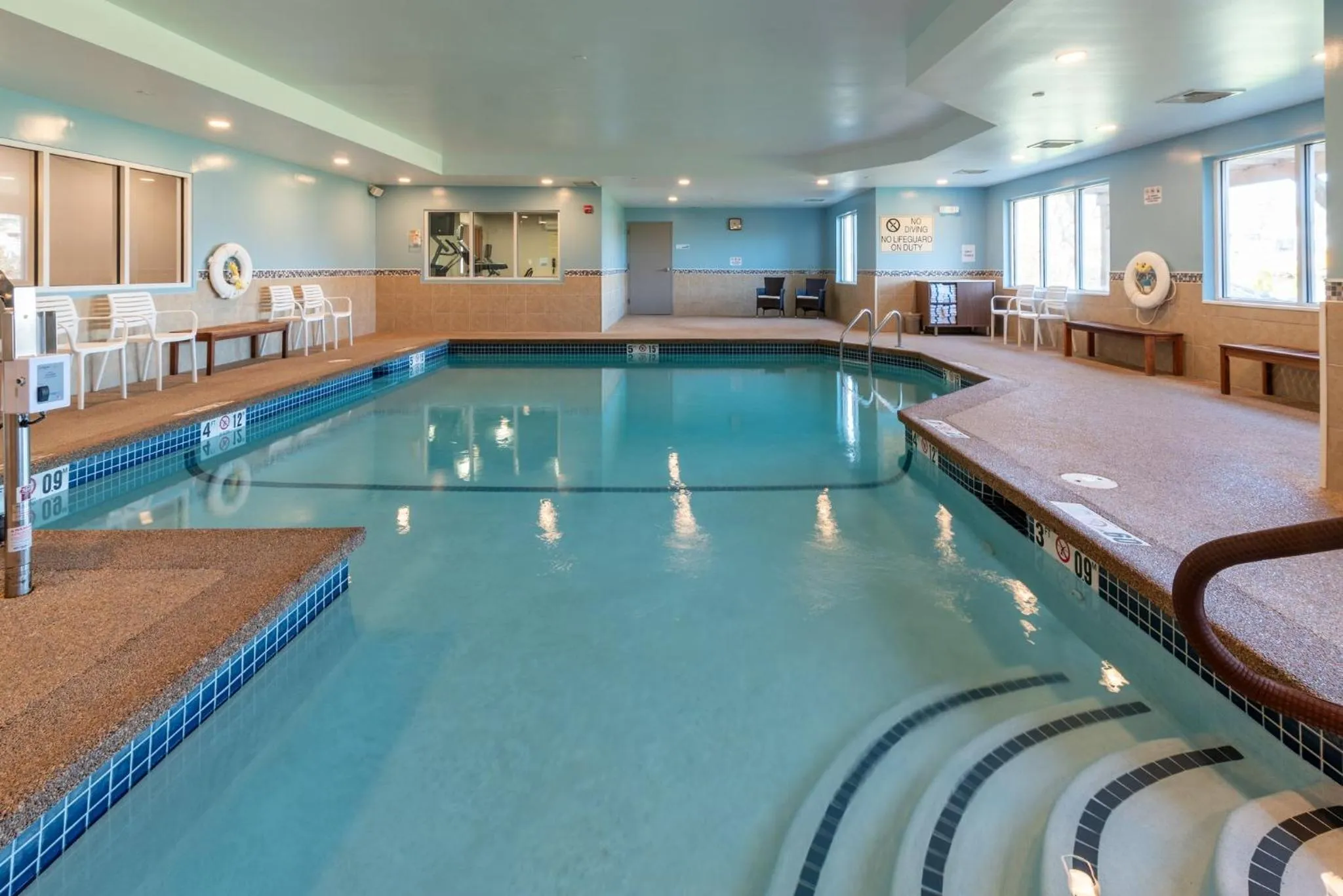 Swimming pool in Holiday Inn Express Hotel & Suites Hampton South-Seabrook by IHG