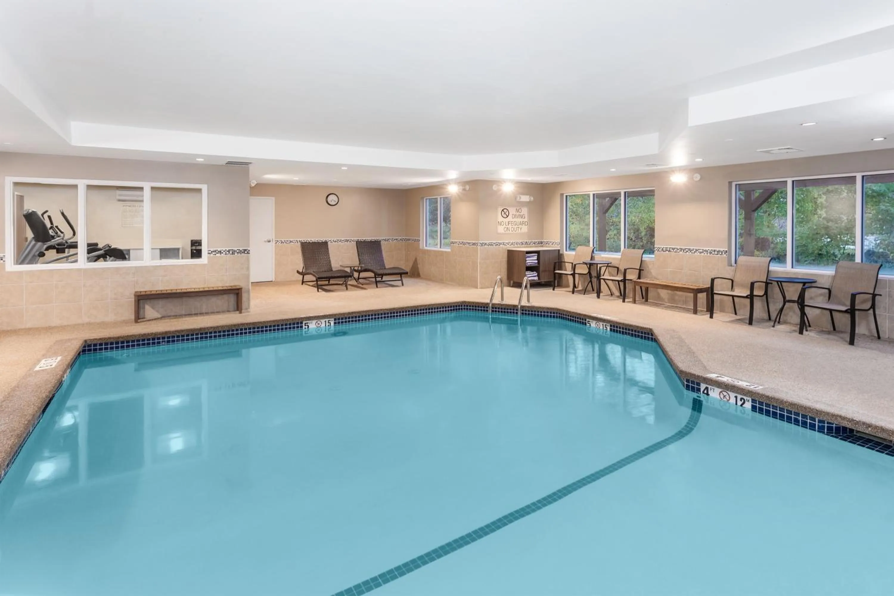 Swimming pool in Holiday Inn Express Hotel & Suites Hampton South-Seabrook by IHG