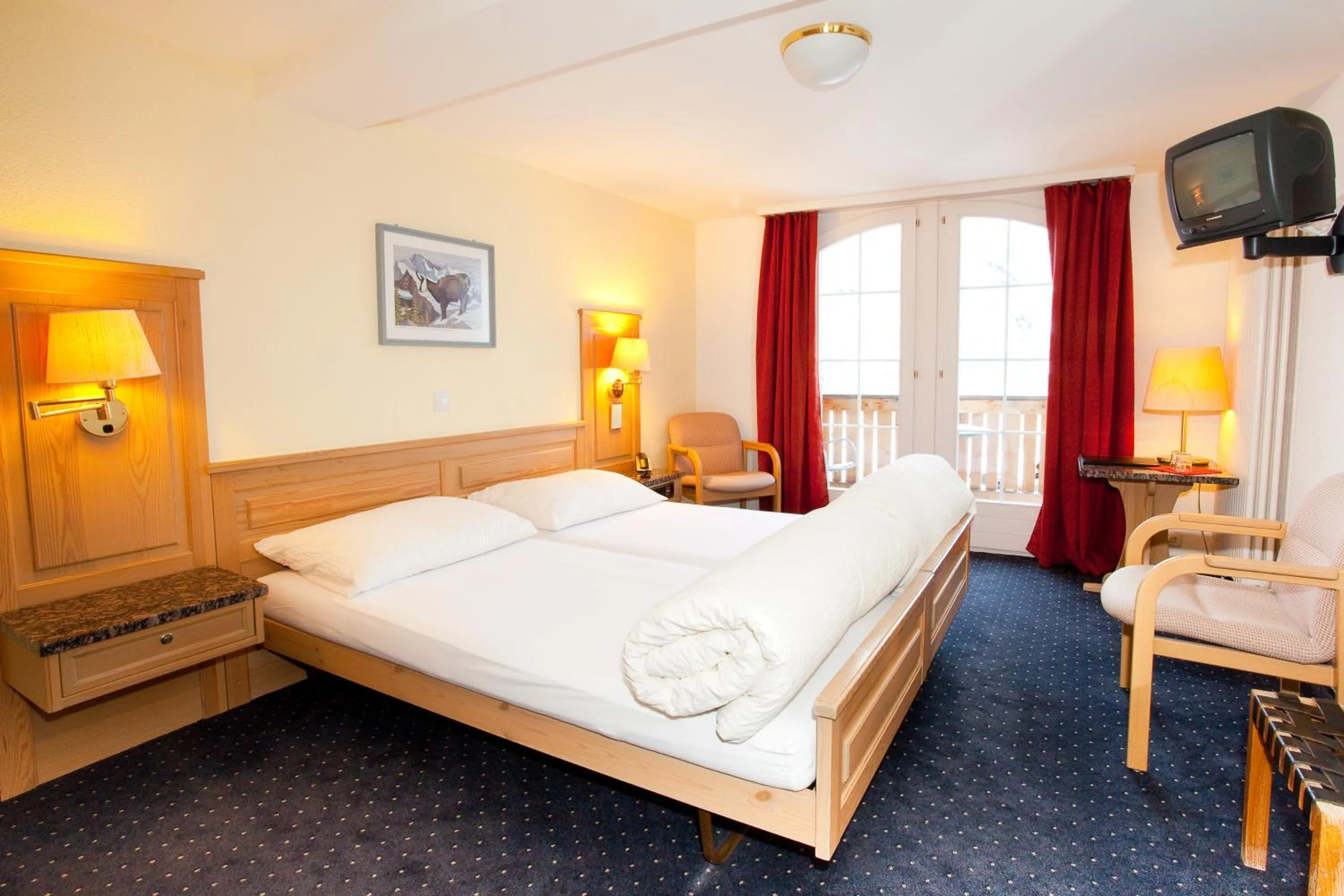 Bed in Hotel Jungfrau Mürren