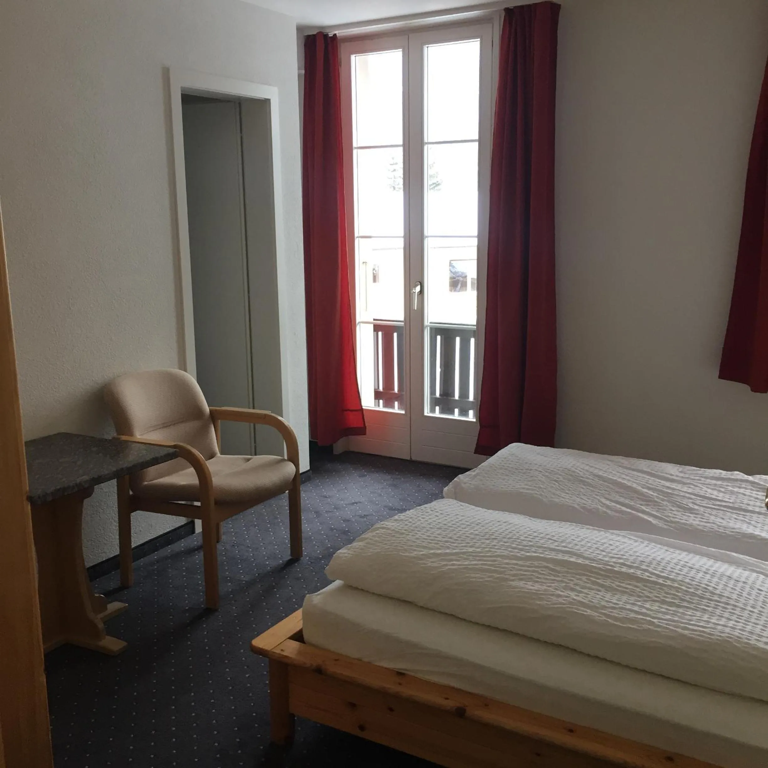 Bed in Hotel Jungfrau Mürren