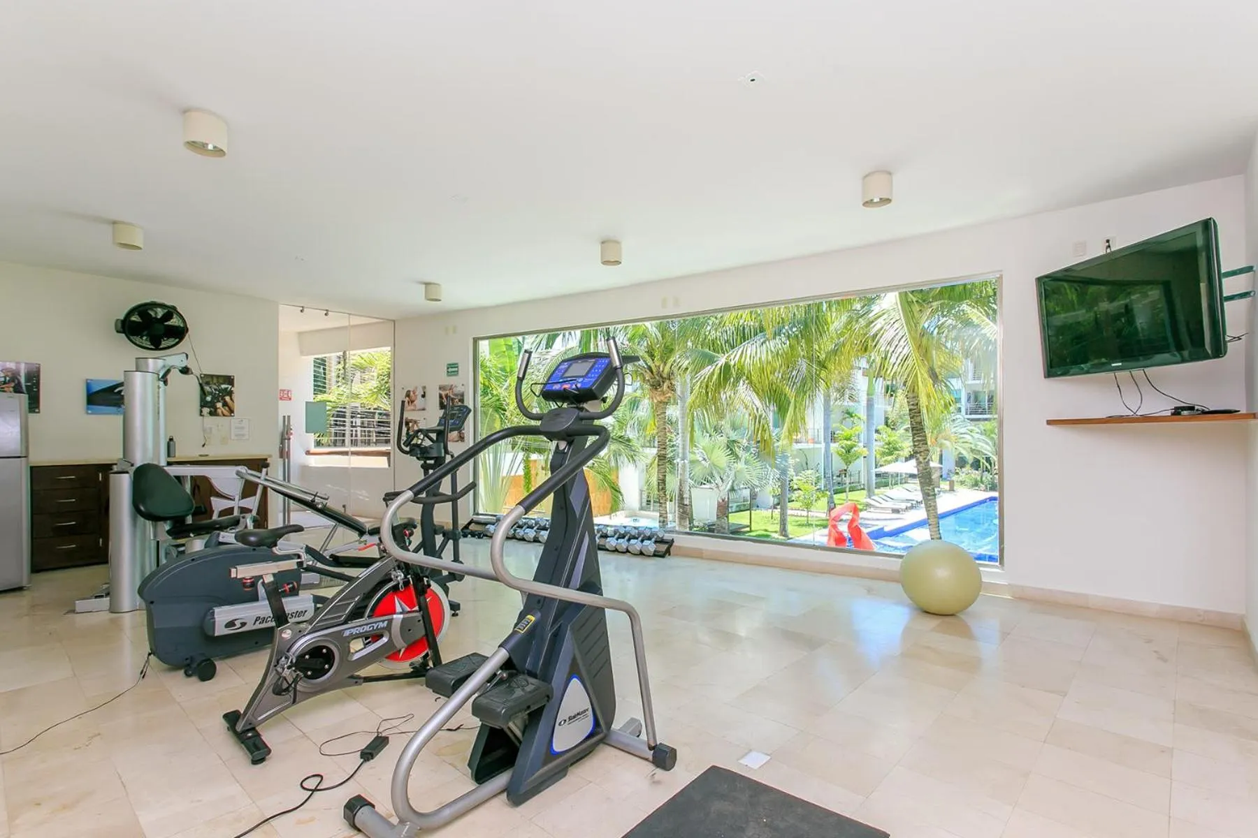 Fitness centre/facilities in 3-Level Condo with a Private Balcony & Rooftop Lounge