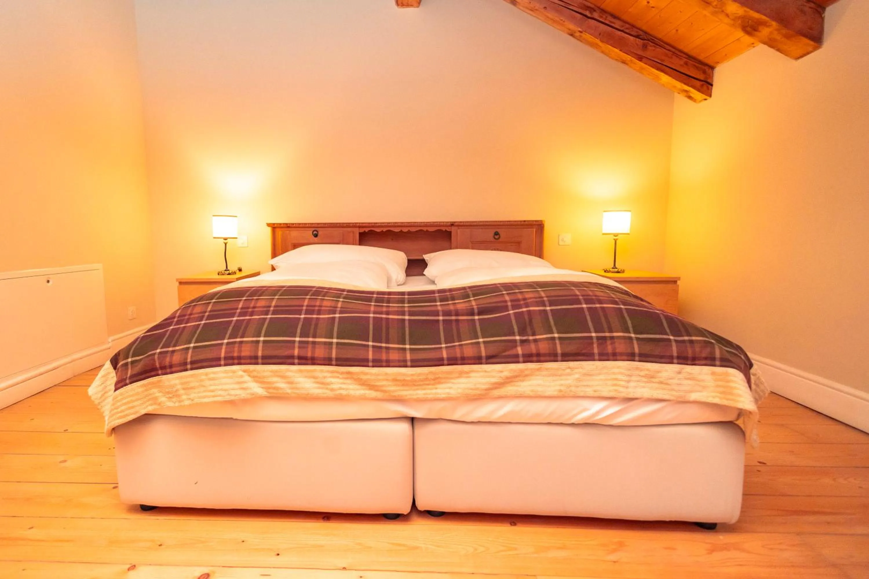 Bed in Hotel Bernina 1865 by Kleos Group Collection