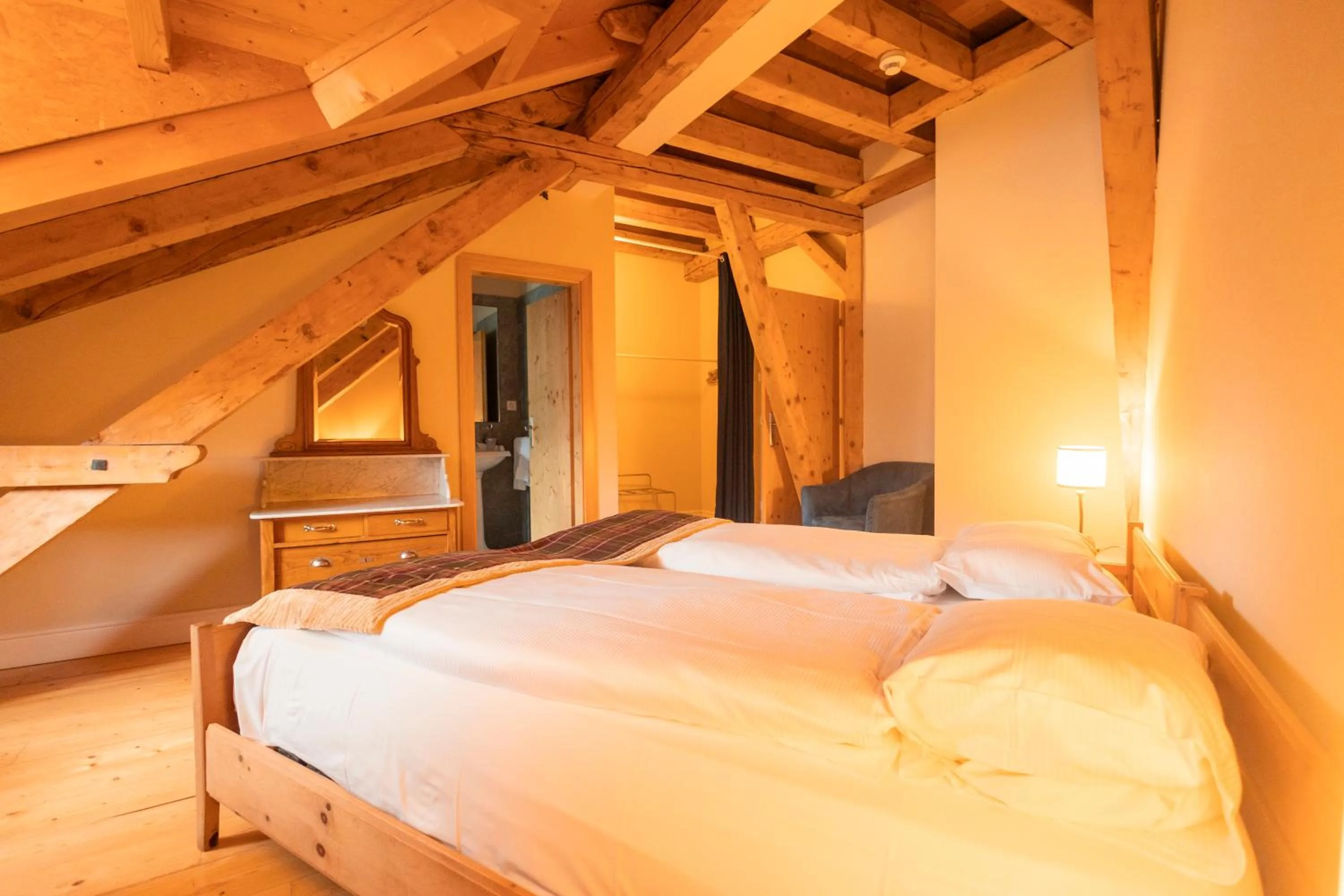 Bed in Hotel Bernina 1865 by Kleos Group Collection