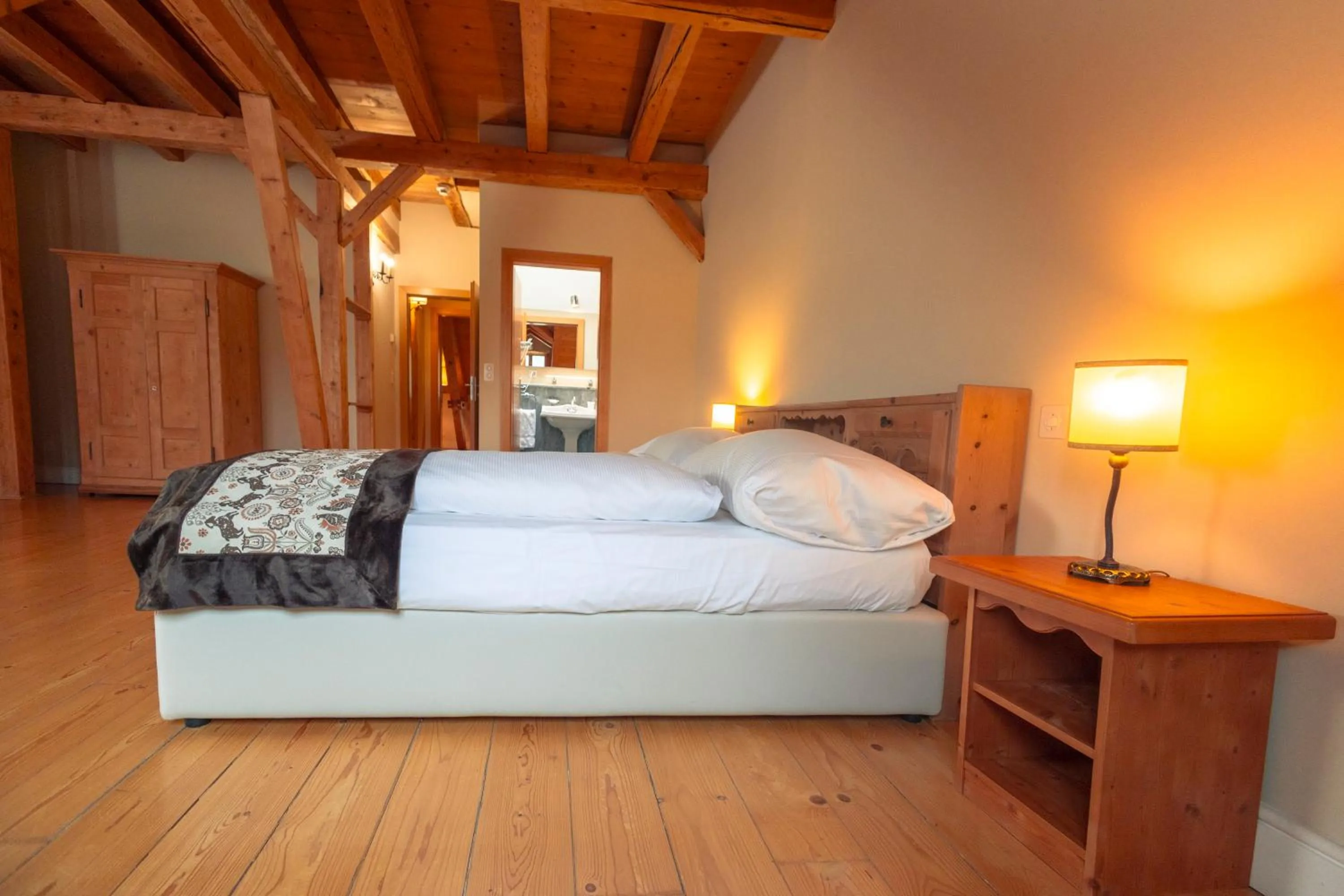 Bed in Hotel Bernina 1865 by Kleos Group Collection