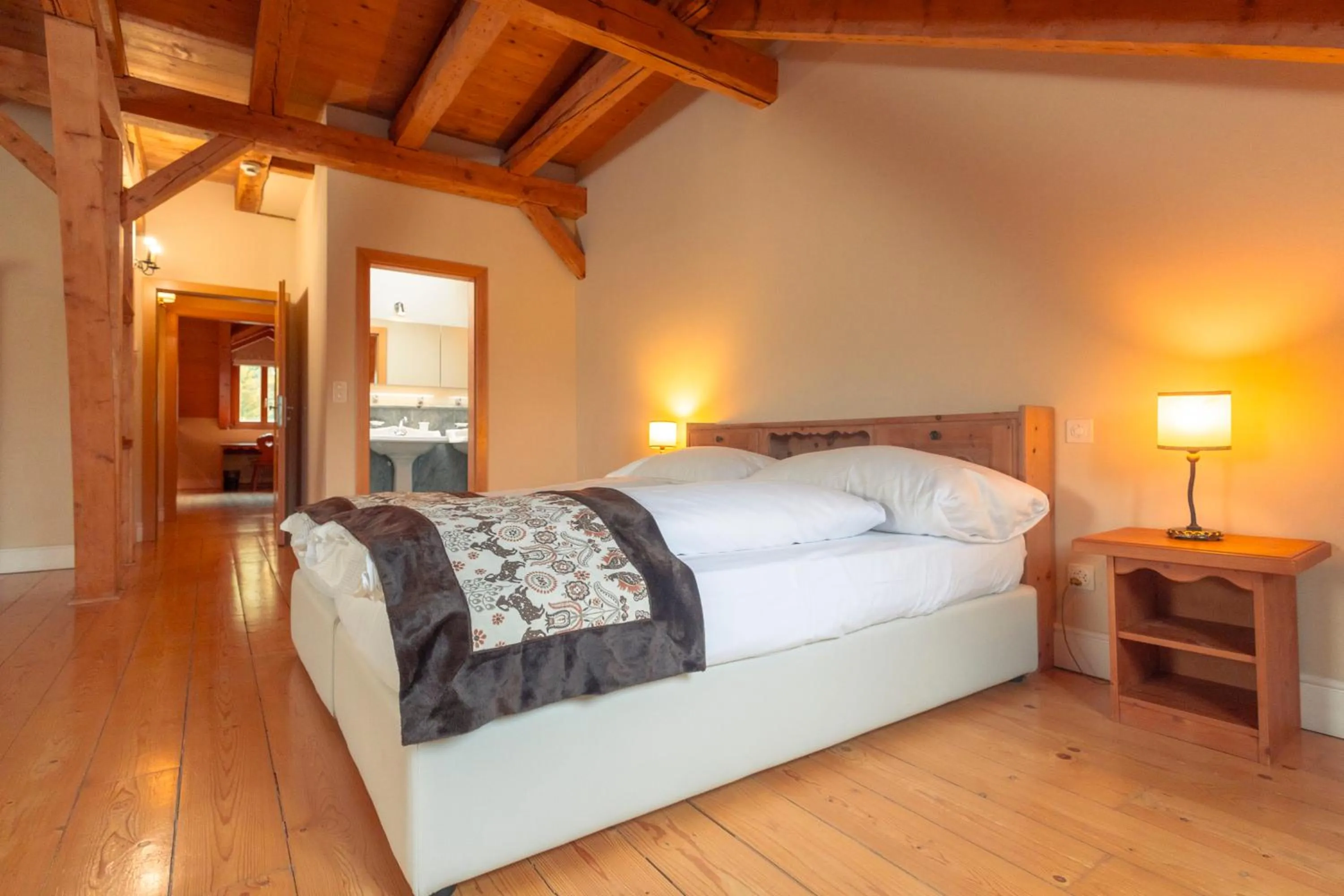 Bed in Hotel Bernina 1865 by Kleos Group Collection