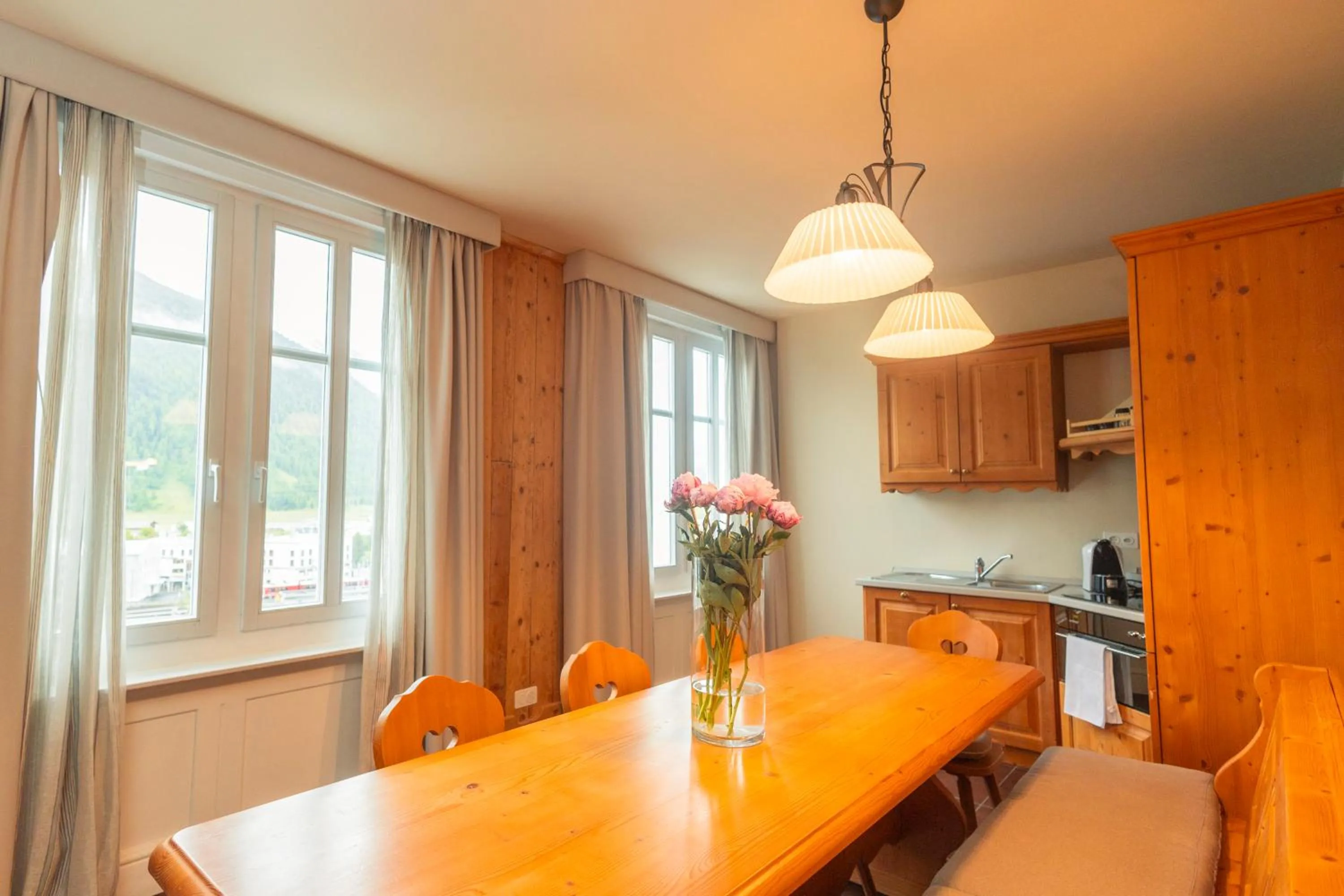 Kitchen or kitchenette in Hotel Bernina 1865 by Kleos Group Collection