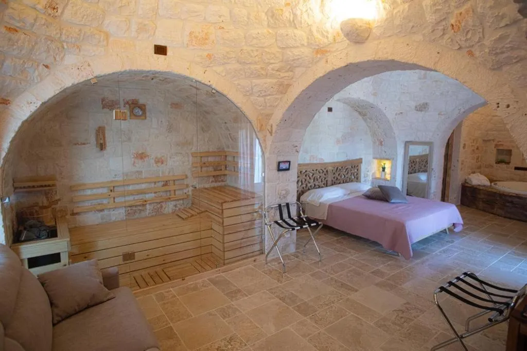 Bed in La Terrazza Sulla Rupe Relais